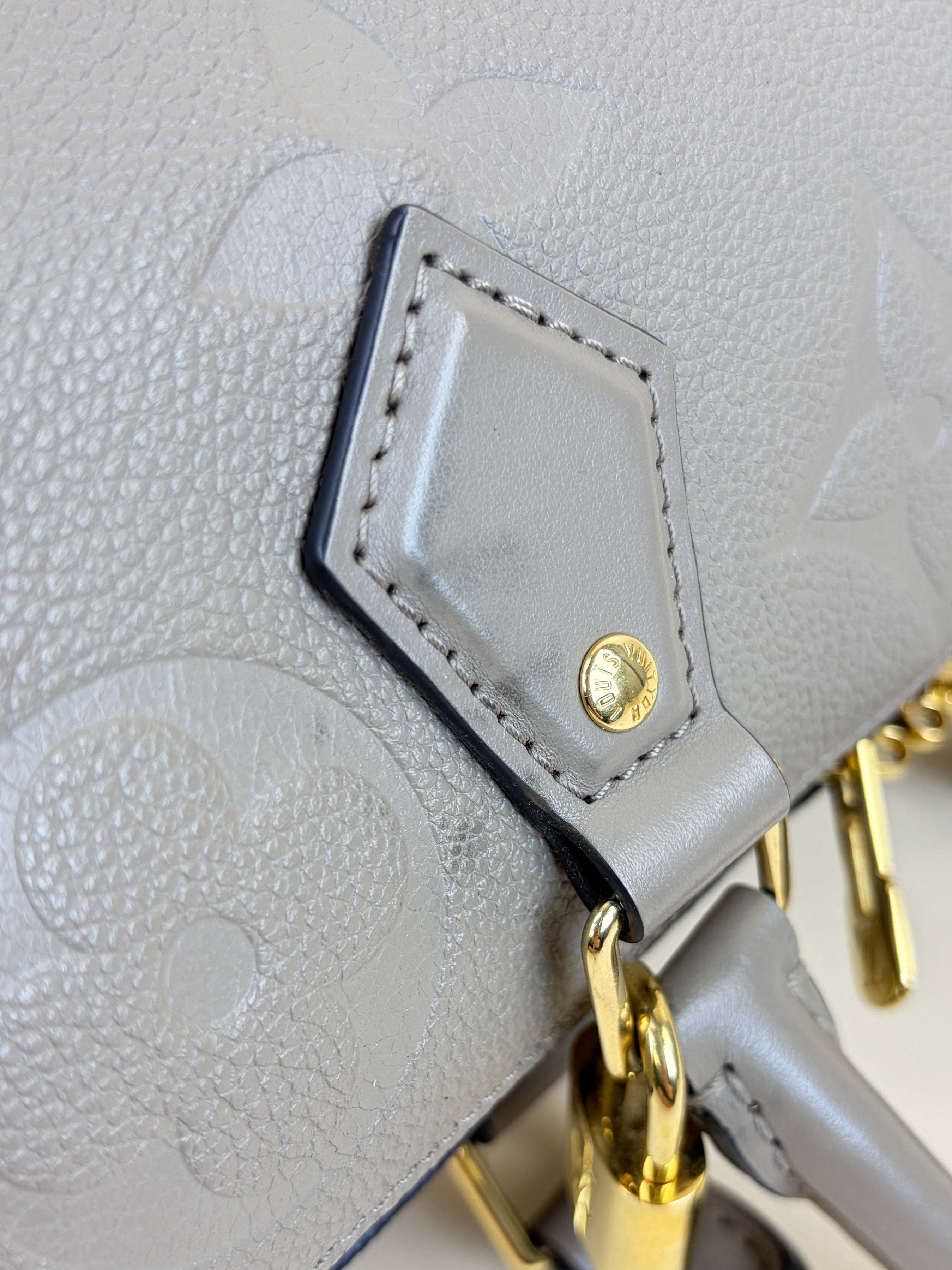 louis Vuitton turtledove monogram empreinte speedy bandouliere 25