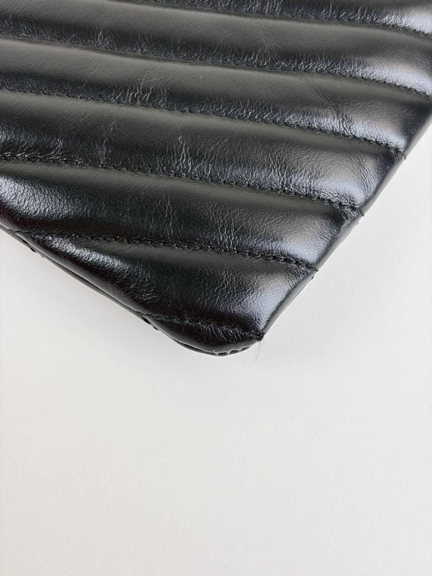 ysl black Cassandra matelassé tablet pouch