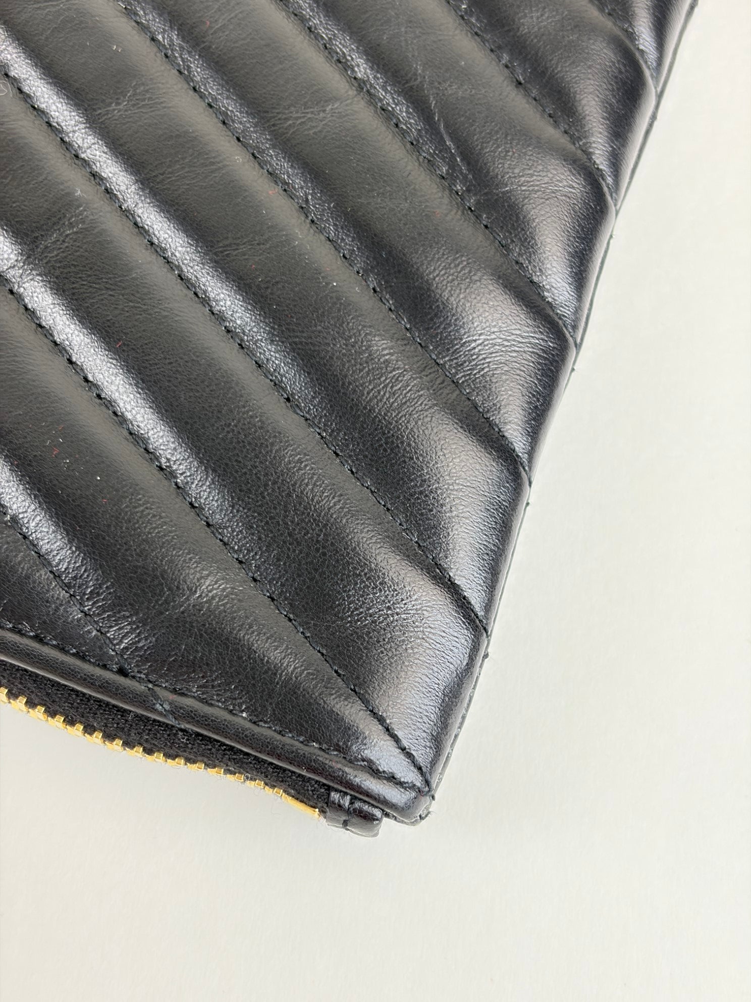 ysl black Cassandra matelassé tablet pouch