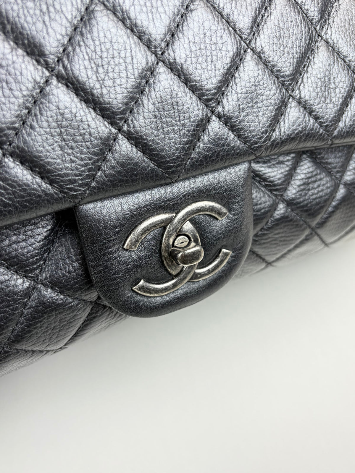 CHANEL black grained calfskin quilted xxl travel flap bag