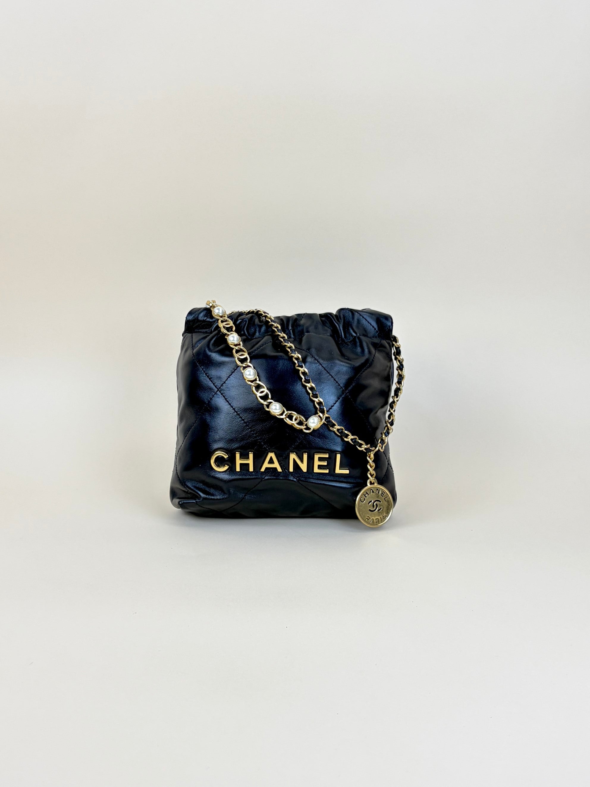 Chanel black shiny calfskin quilted pearl cc chain mini bag