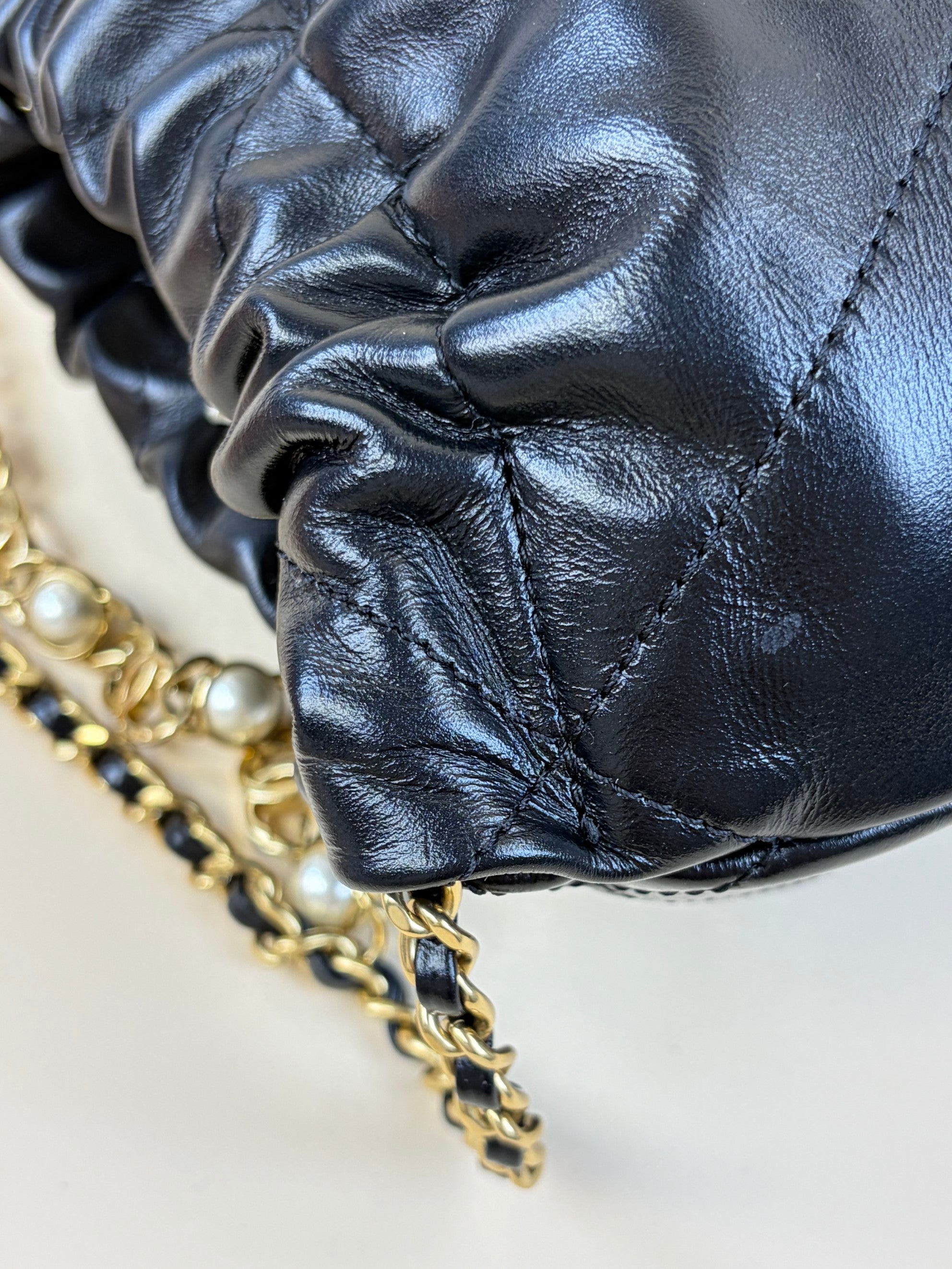 Chanel black shiny calfskin quilted pearl cc chain mini bag