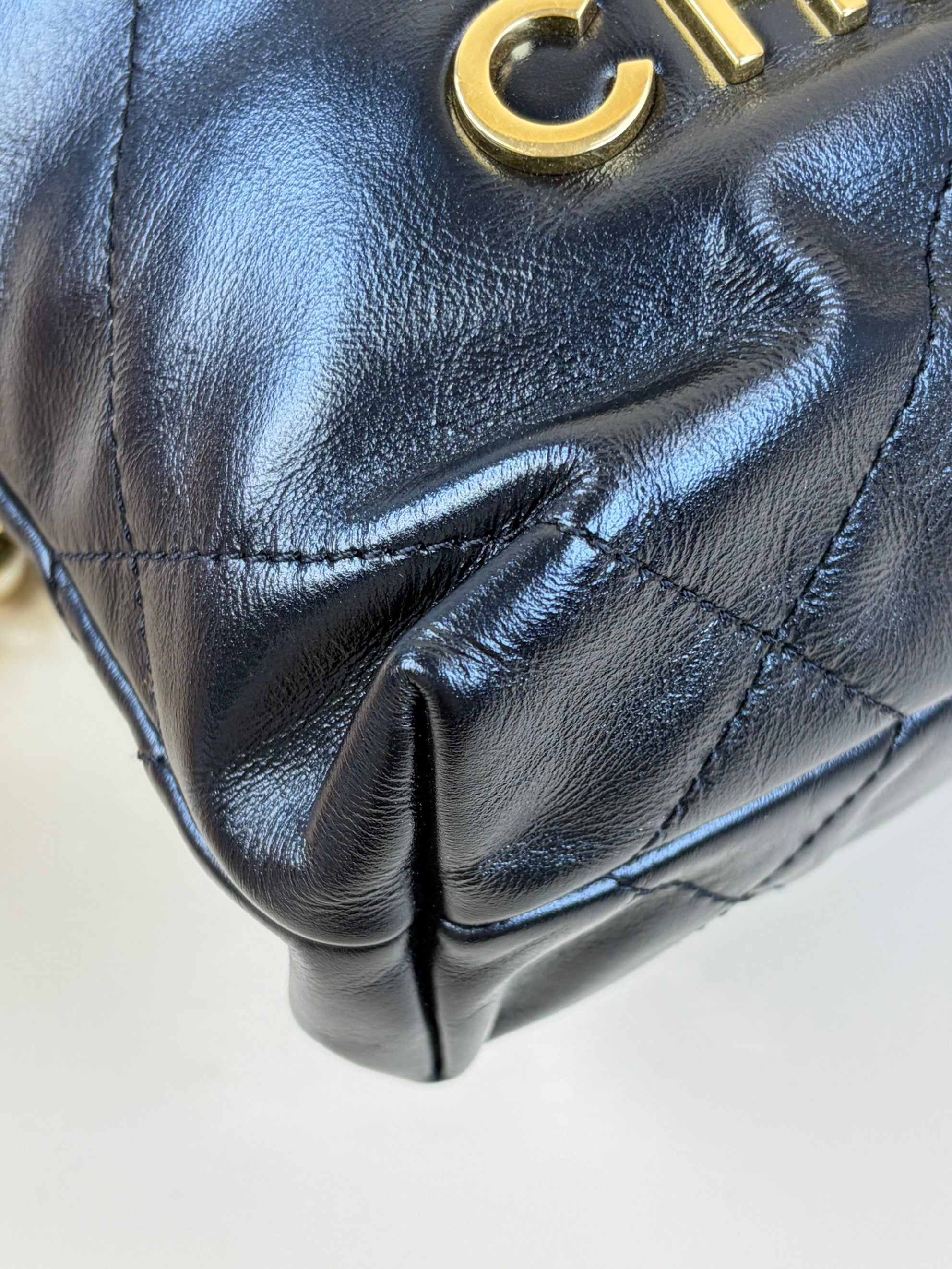 Chanel black shiny calfskin quilted pearl cc chain mini bag