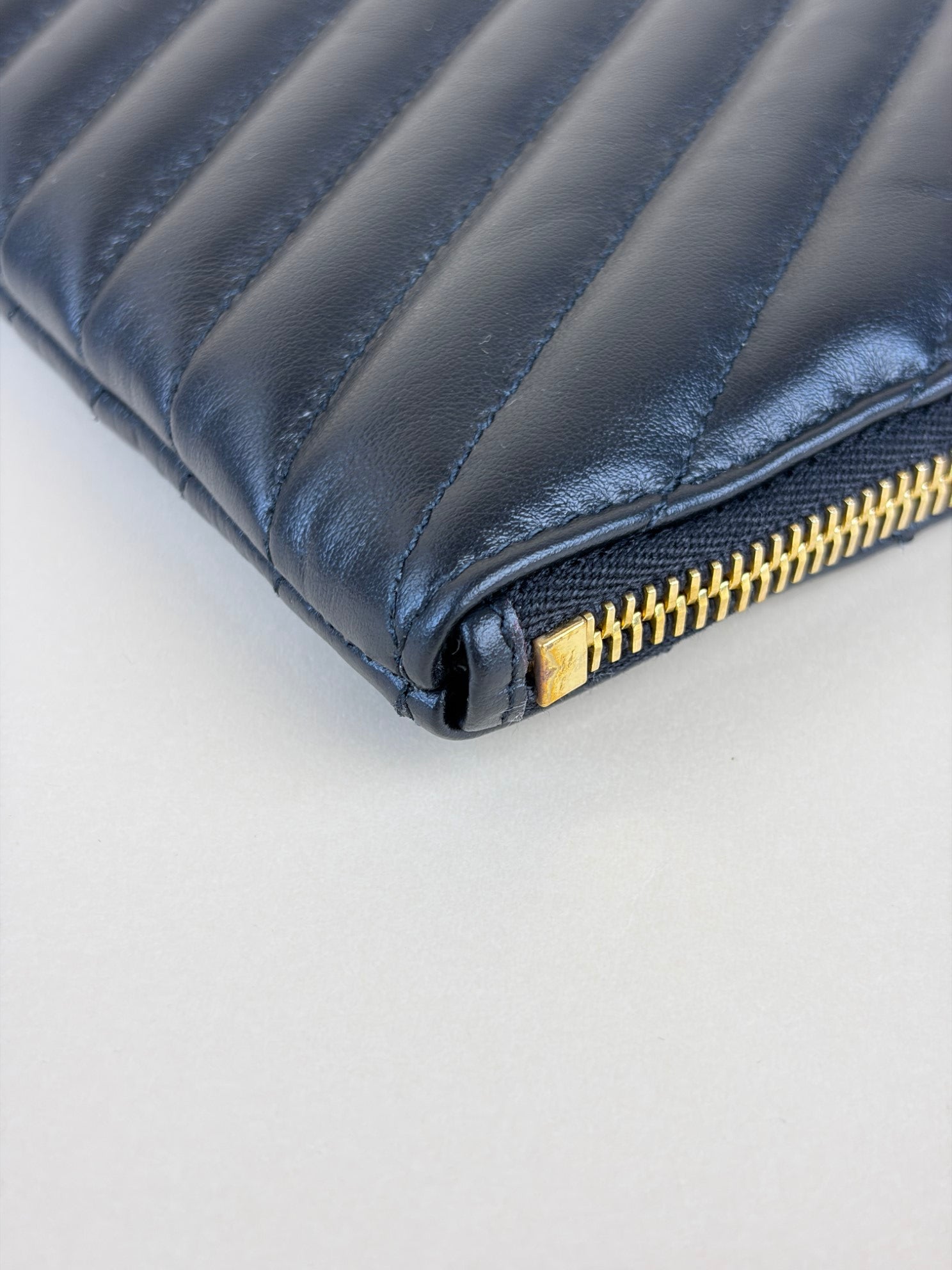 ysl black Cassandra matelassé tablet pouch