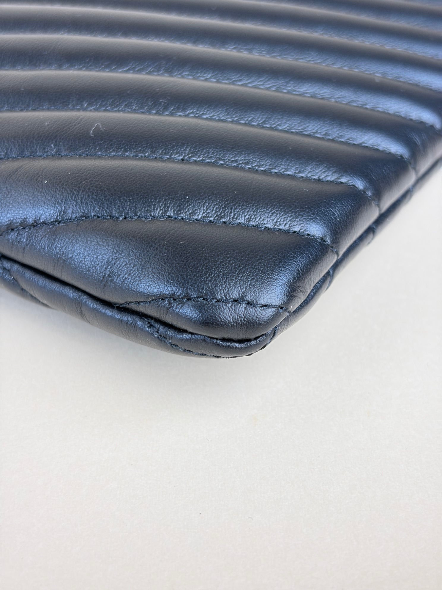 ysl black Cassandra matelassé tablet pouch