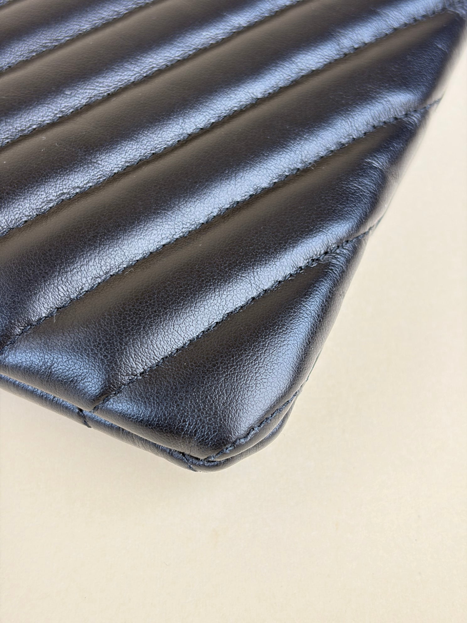 ysl black Cassandra matelassé tablet pouch