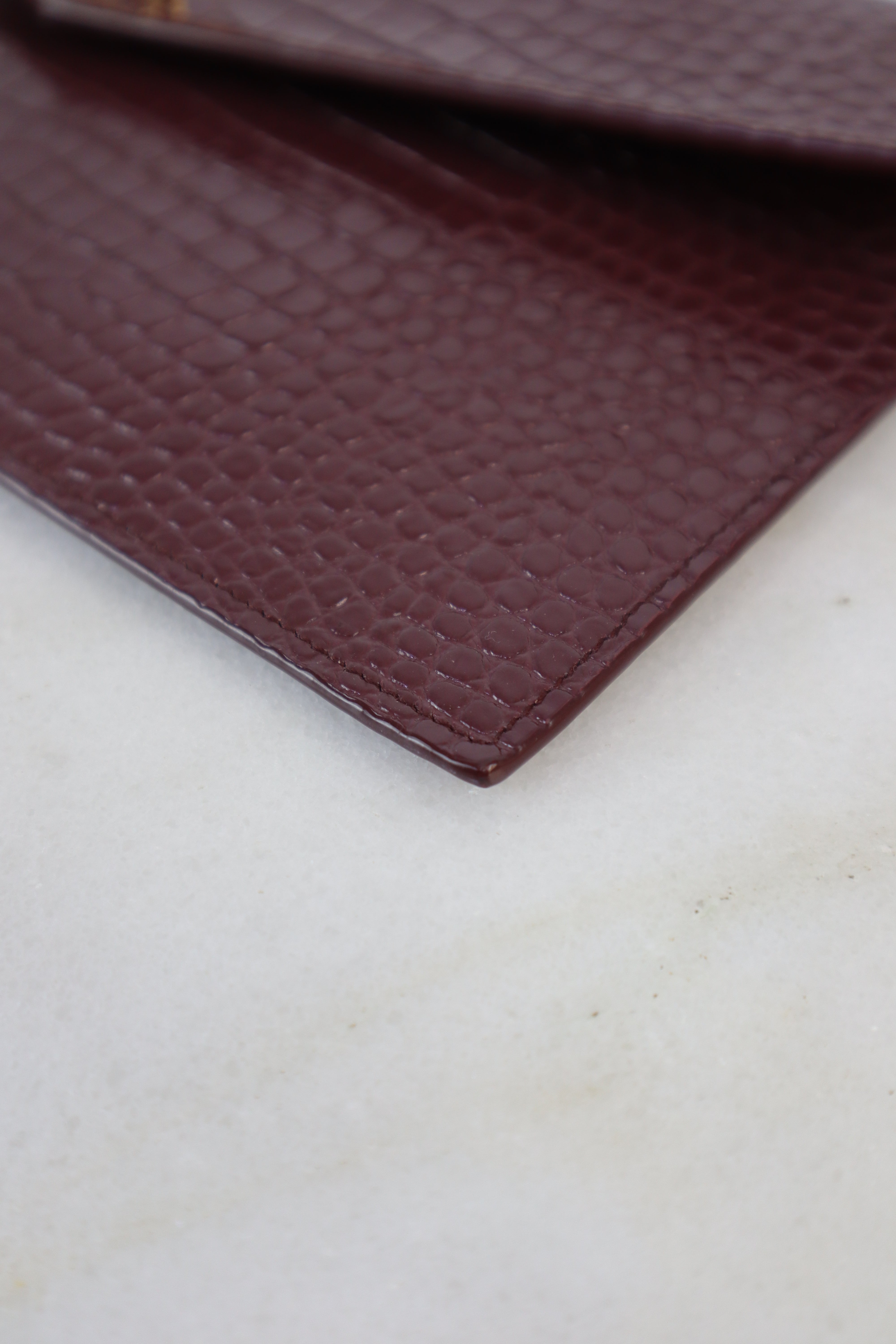 YSL Burgundy Croco Uptown Clutch