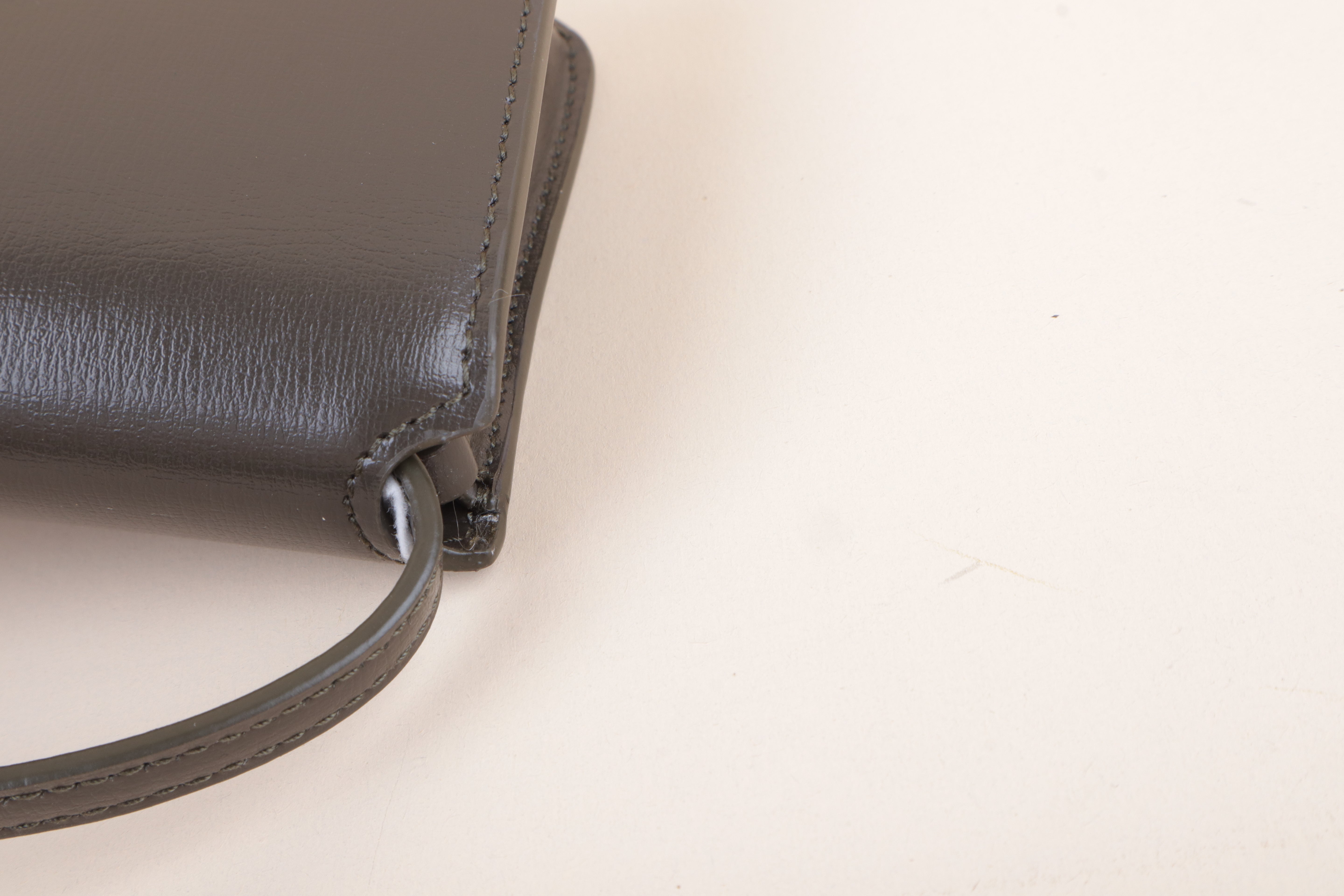 YSL Cassandre phone holder light musk