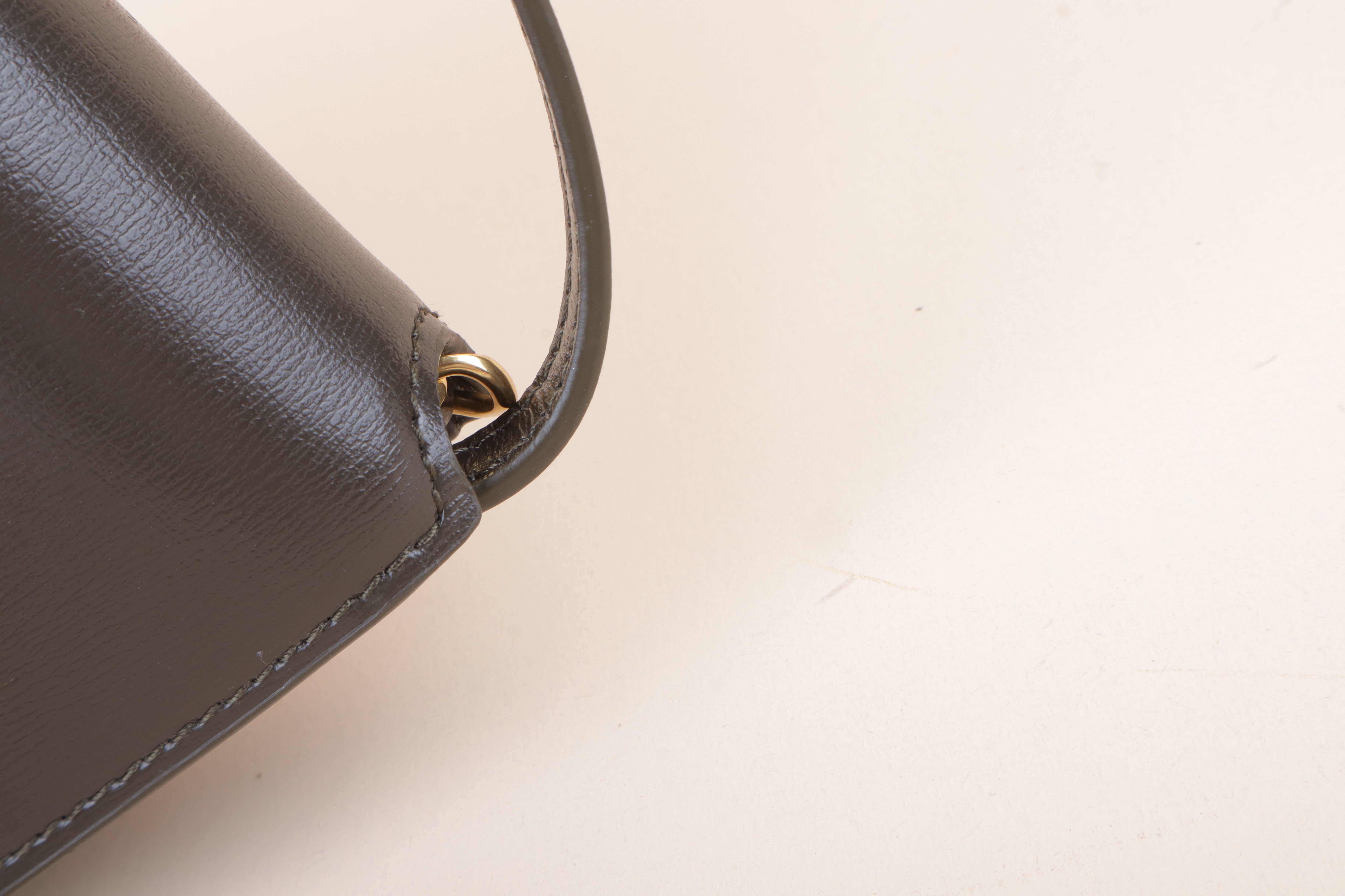YSL Cassandre phone holder light musk
