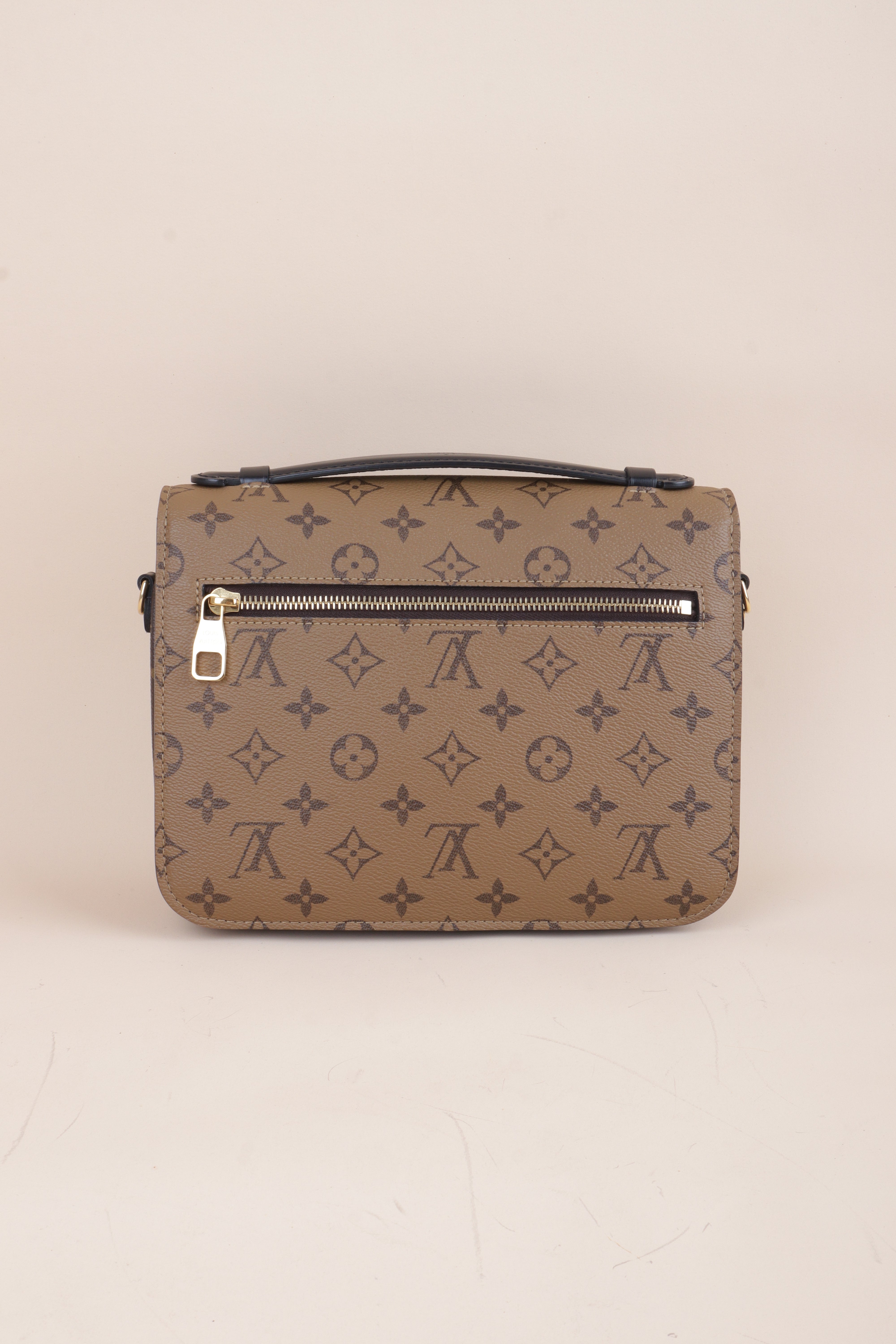 Louis Vuitton Monogram Reverse Pochette Bag