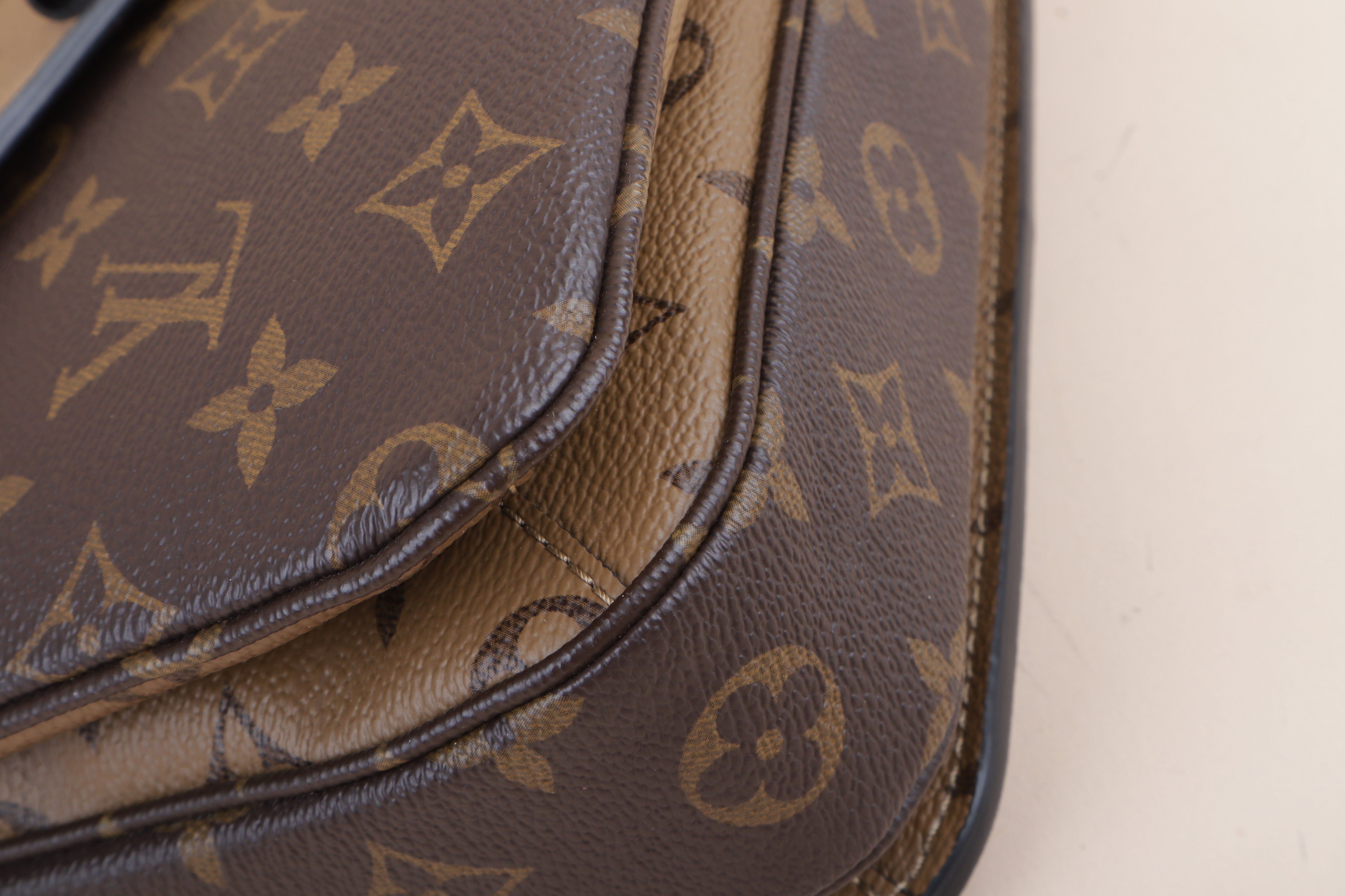 Louis Vuitton Monogram Reverse Pochette Bag