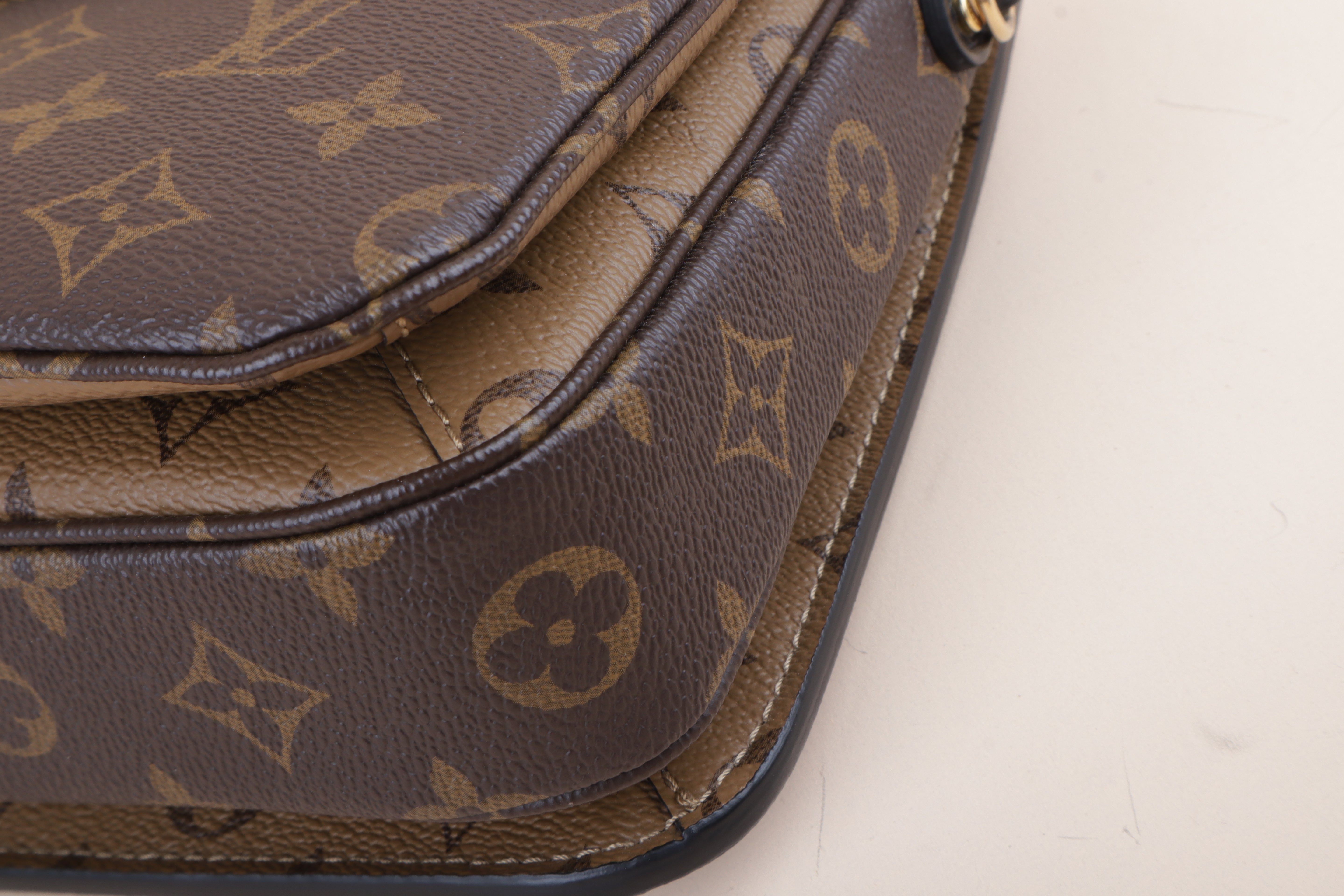 Louis Vuitton Monogram Reverse Pochette Bag