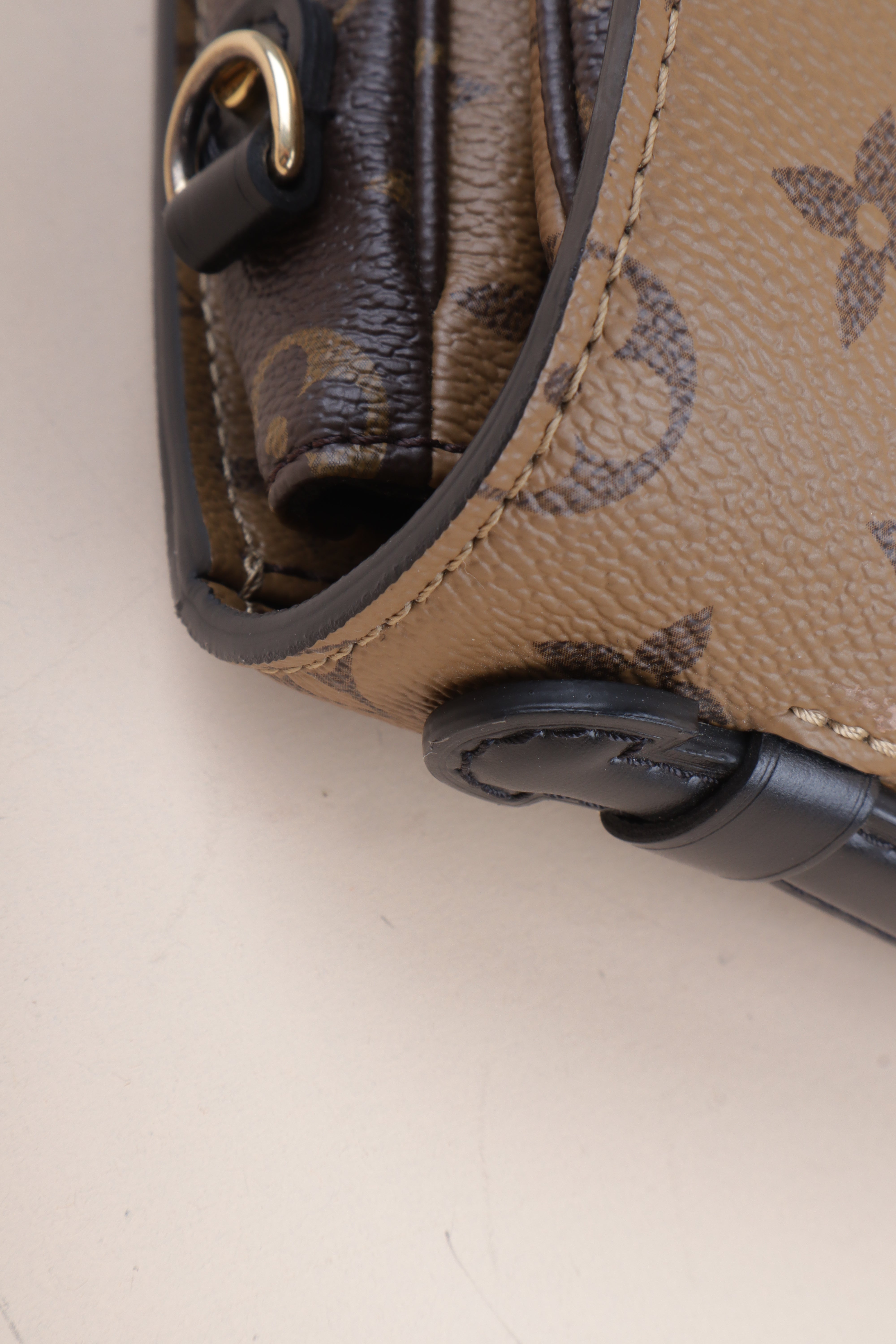 Louis Vuitton Monogram Reverse Pochette Bag