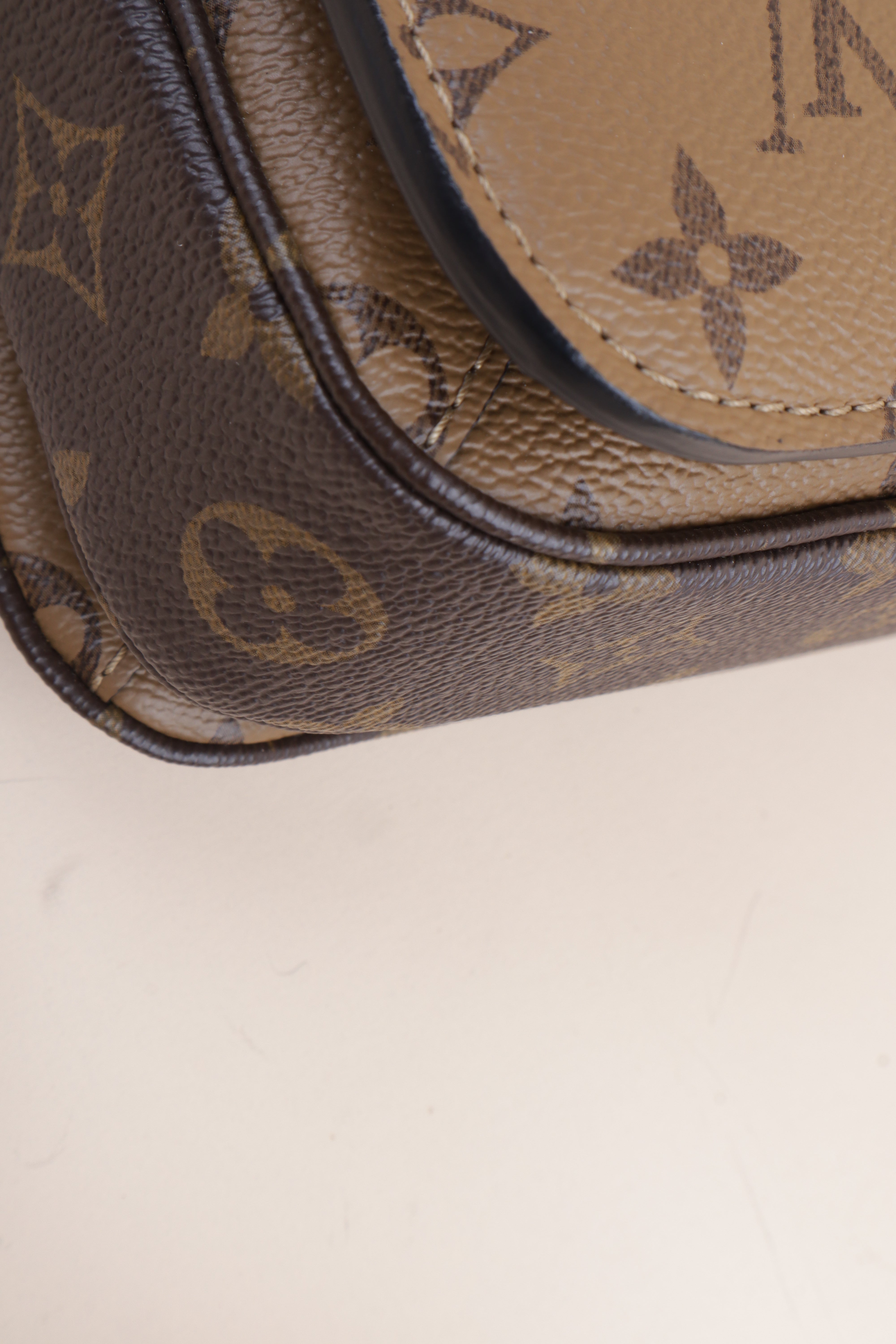 Louis Vuitton Monogram Reverse Pochette Bag