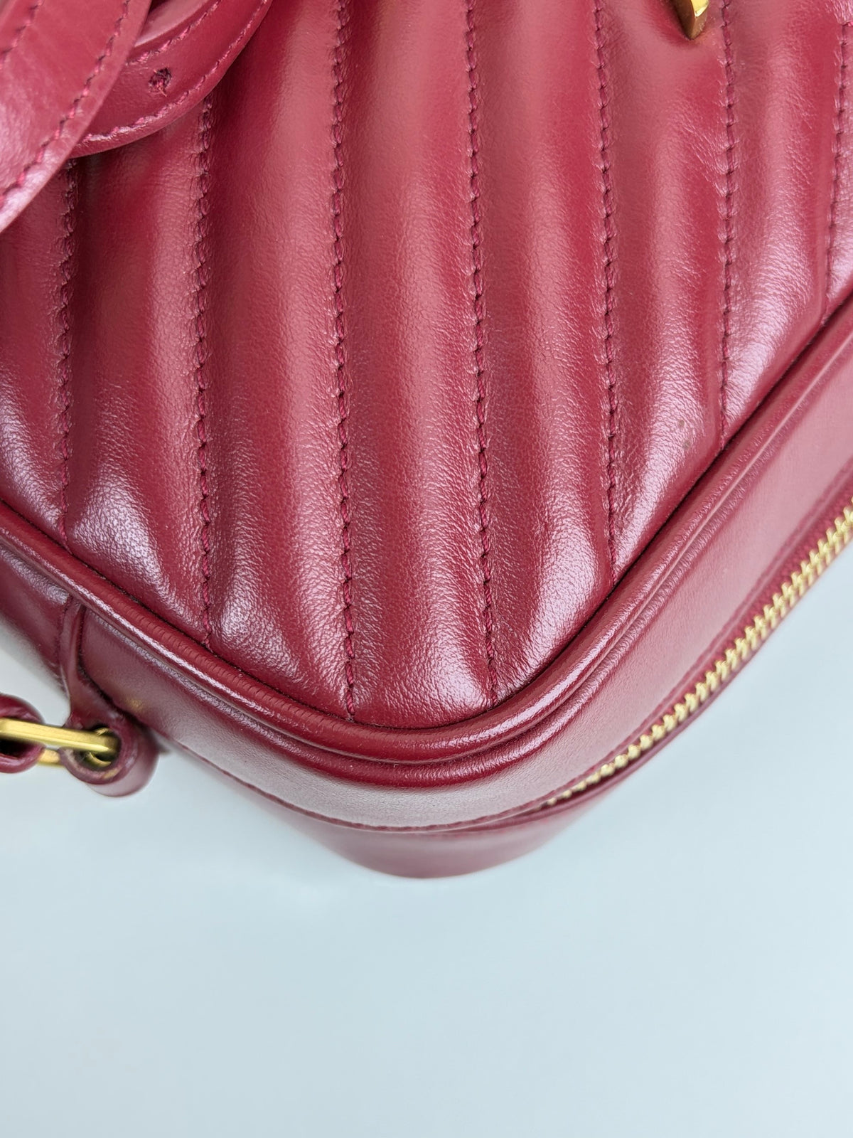 YSL red calfskin matelassé monogram Lou camera bag