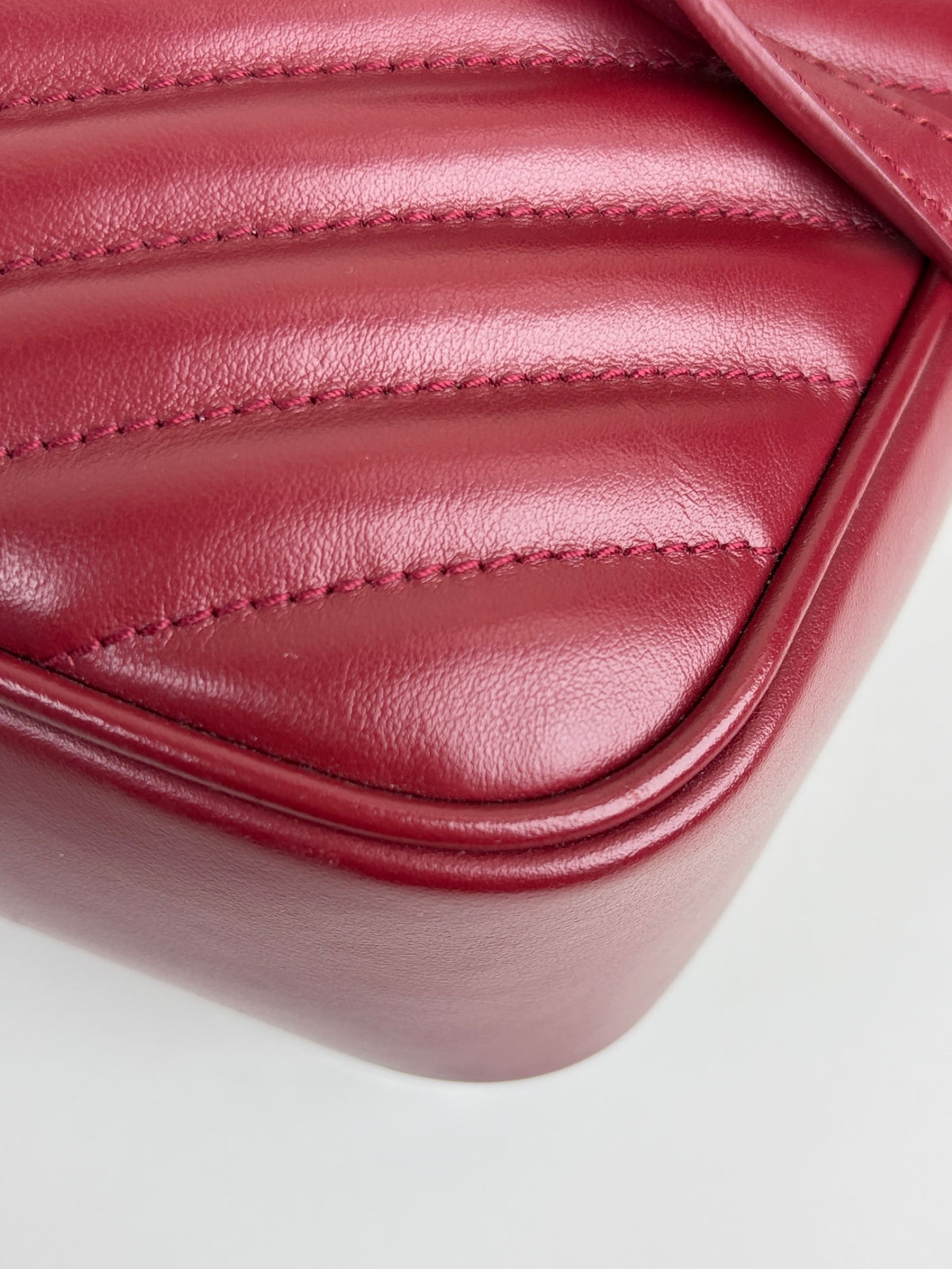 YSL red calfskin matelassé monogram Lou camera bag