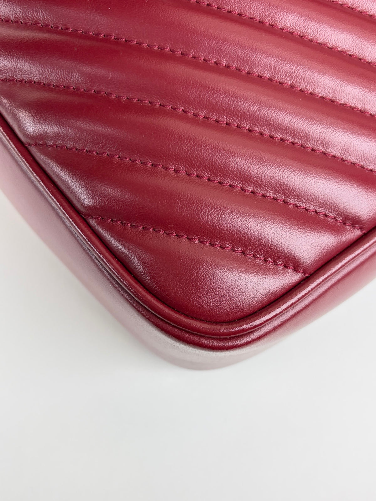 YSL red calfskin matelassé monogram Lou camera bag