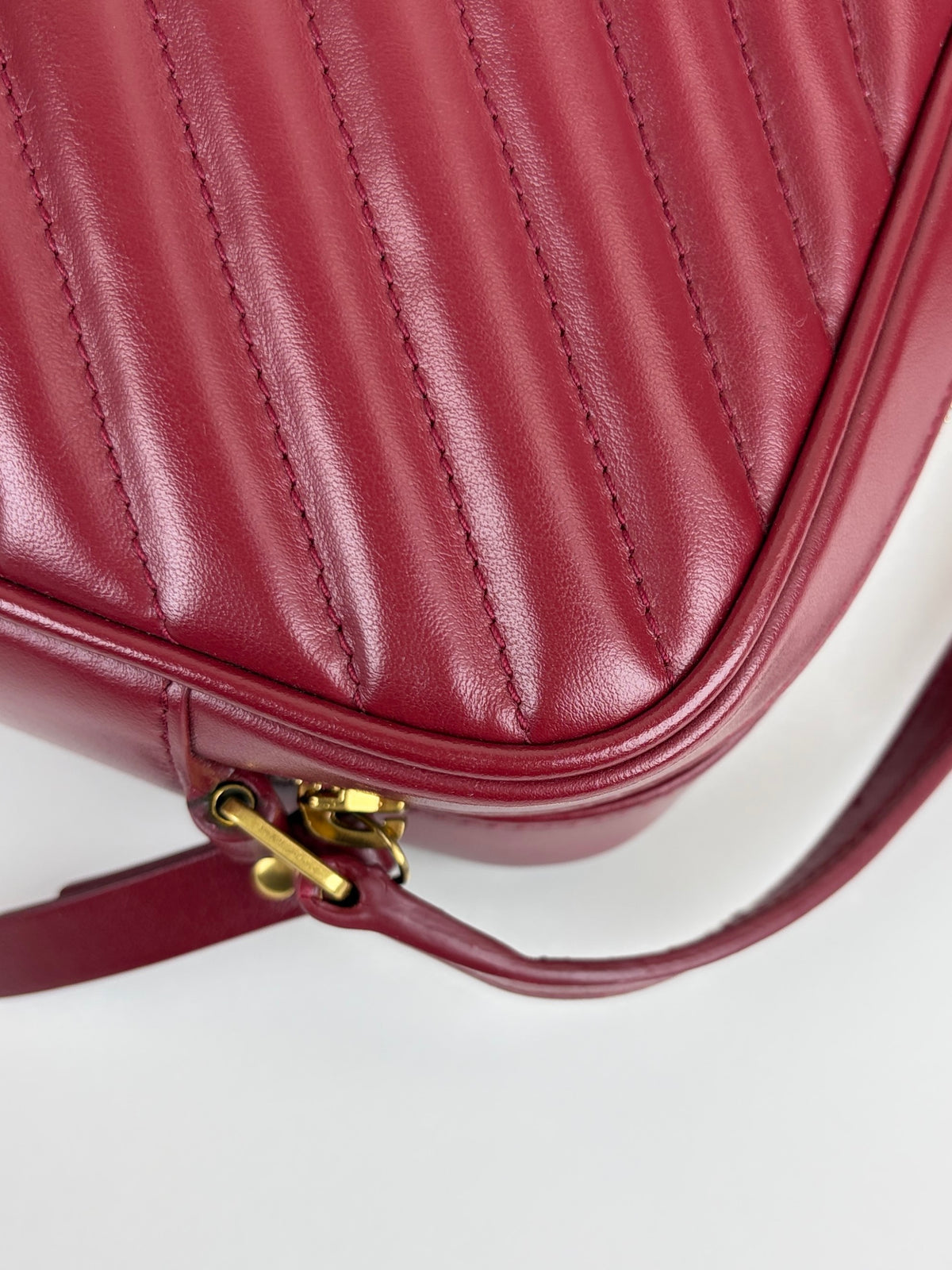YSL red calfskin matelassé monogram Lou camera bag