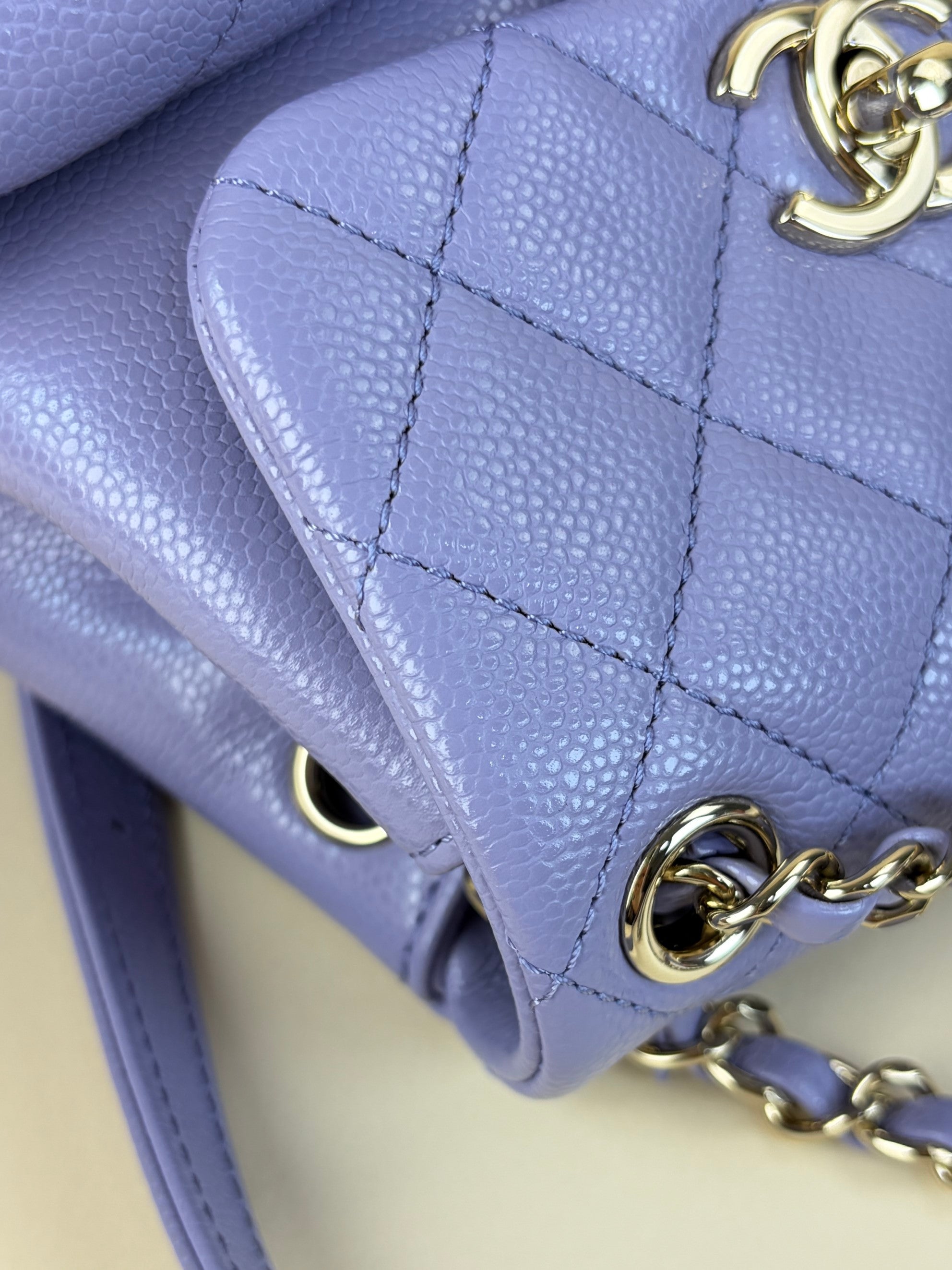 Chanel shiny caviar quilted small duma pockets drawstring backpack