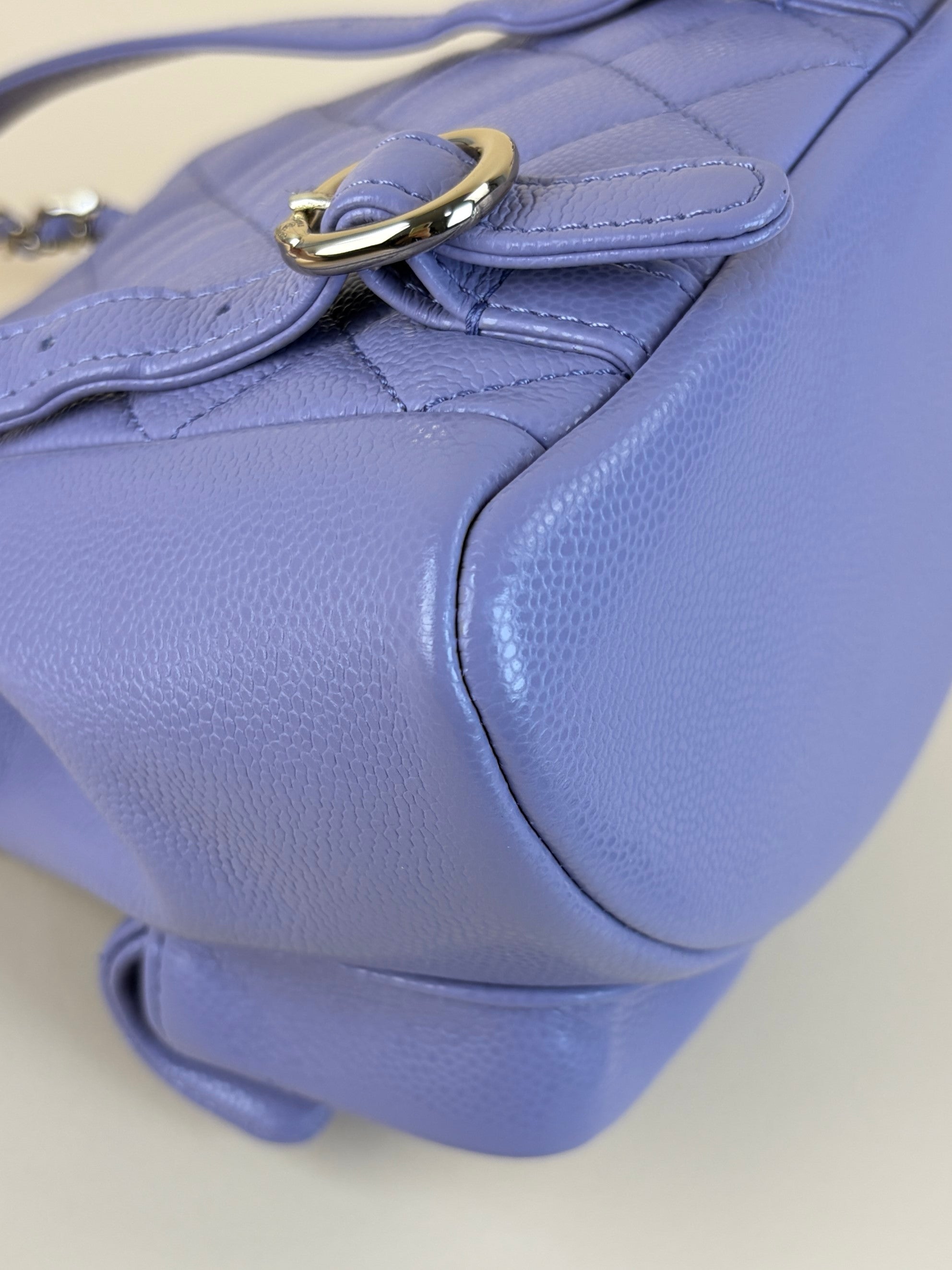 Chanel shiny caviar quilted small duma pockets drawstring backpack