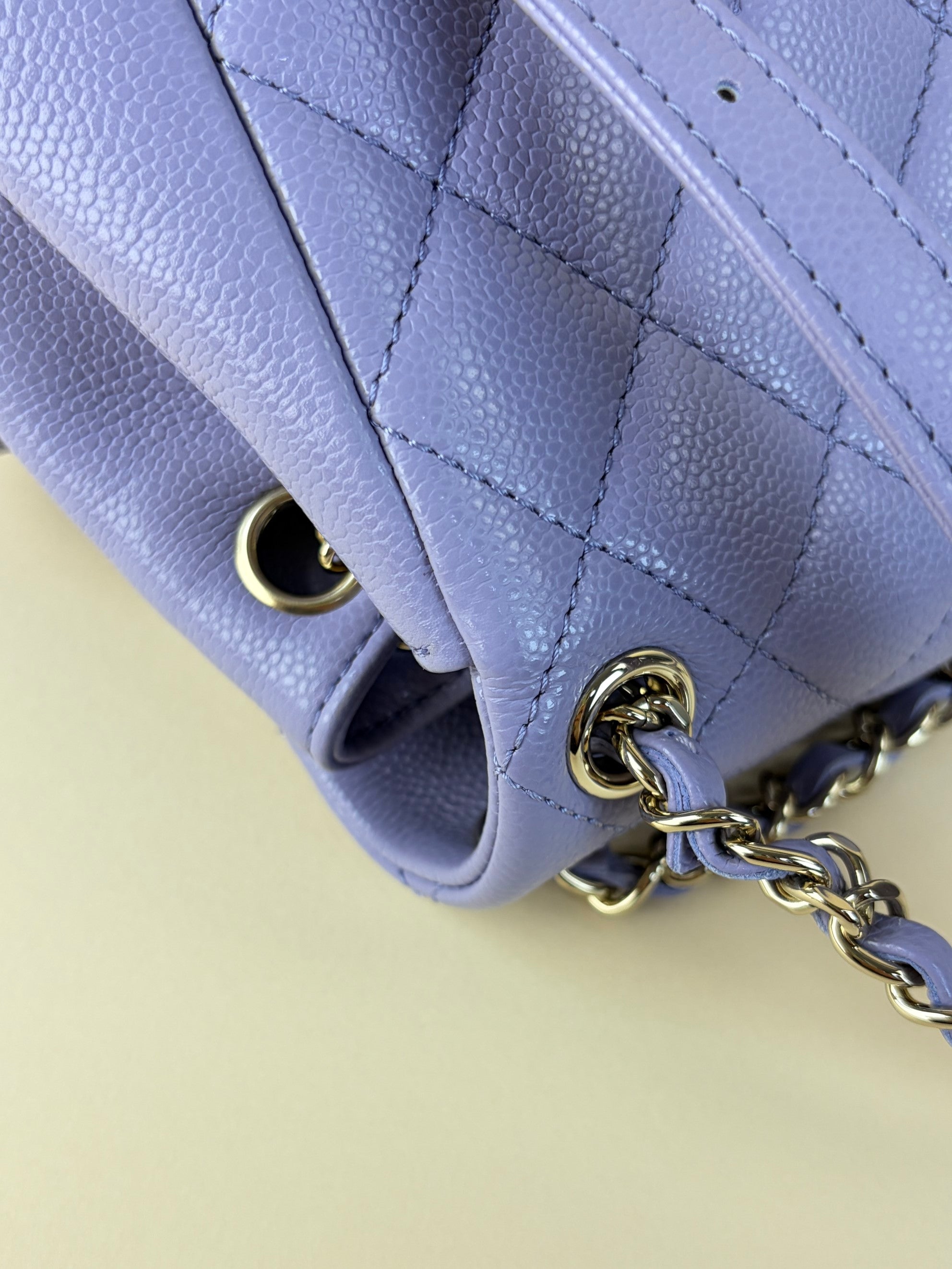 Chanel shiny caviar quilted small duma pockets drawstring backpack