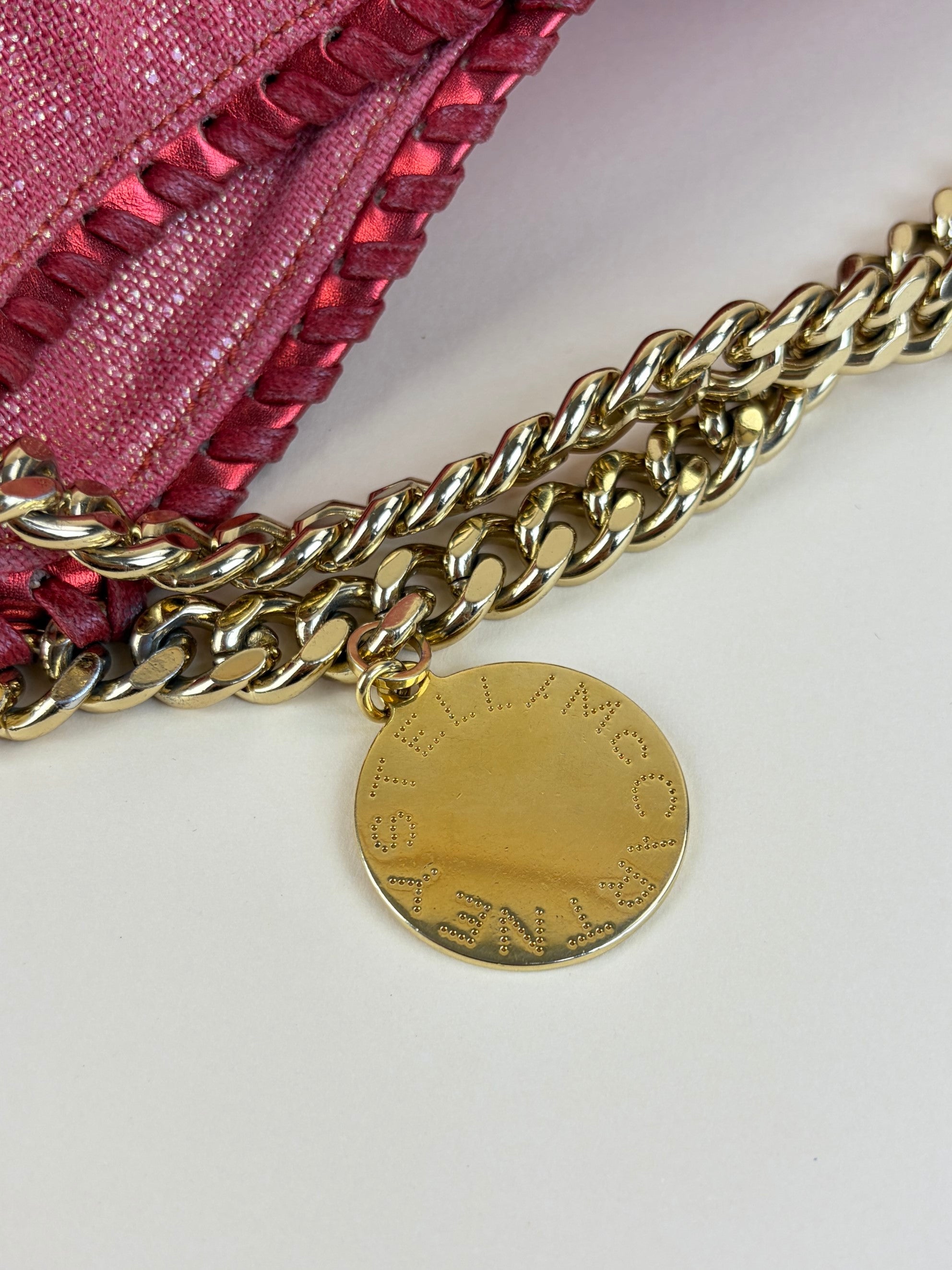 Stella McCartney PINK/red shiny and metallic trimmed leather fold over bag