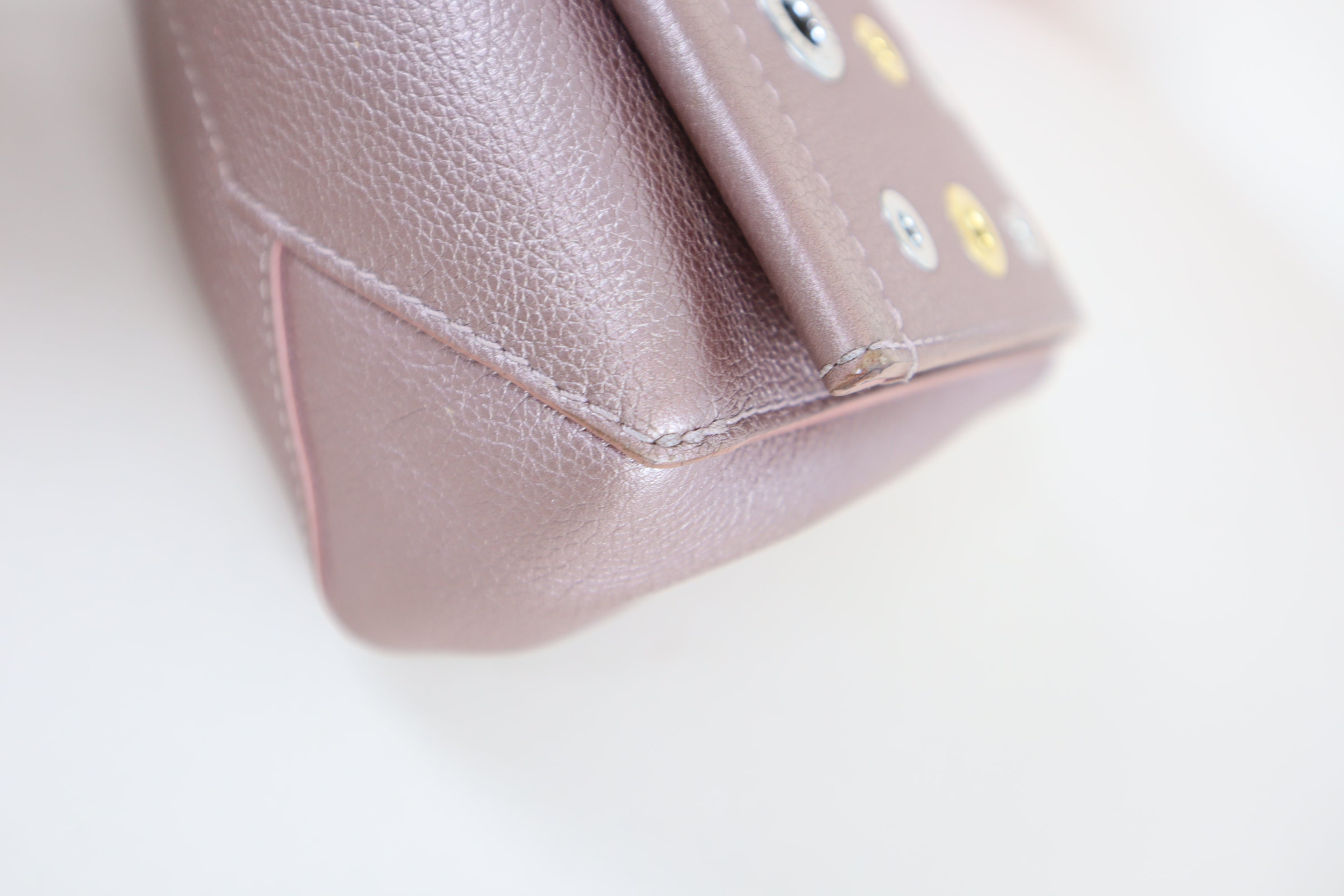 Louis Vuitton Metallic Pink Eyelet Lock Me Bag
