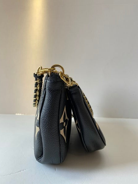 Louis Vuitton Bicolor Empreinte Monogram Giant Multi Pochette-Pochette-Louis Vuitton-The Closet Egypt