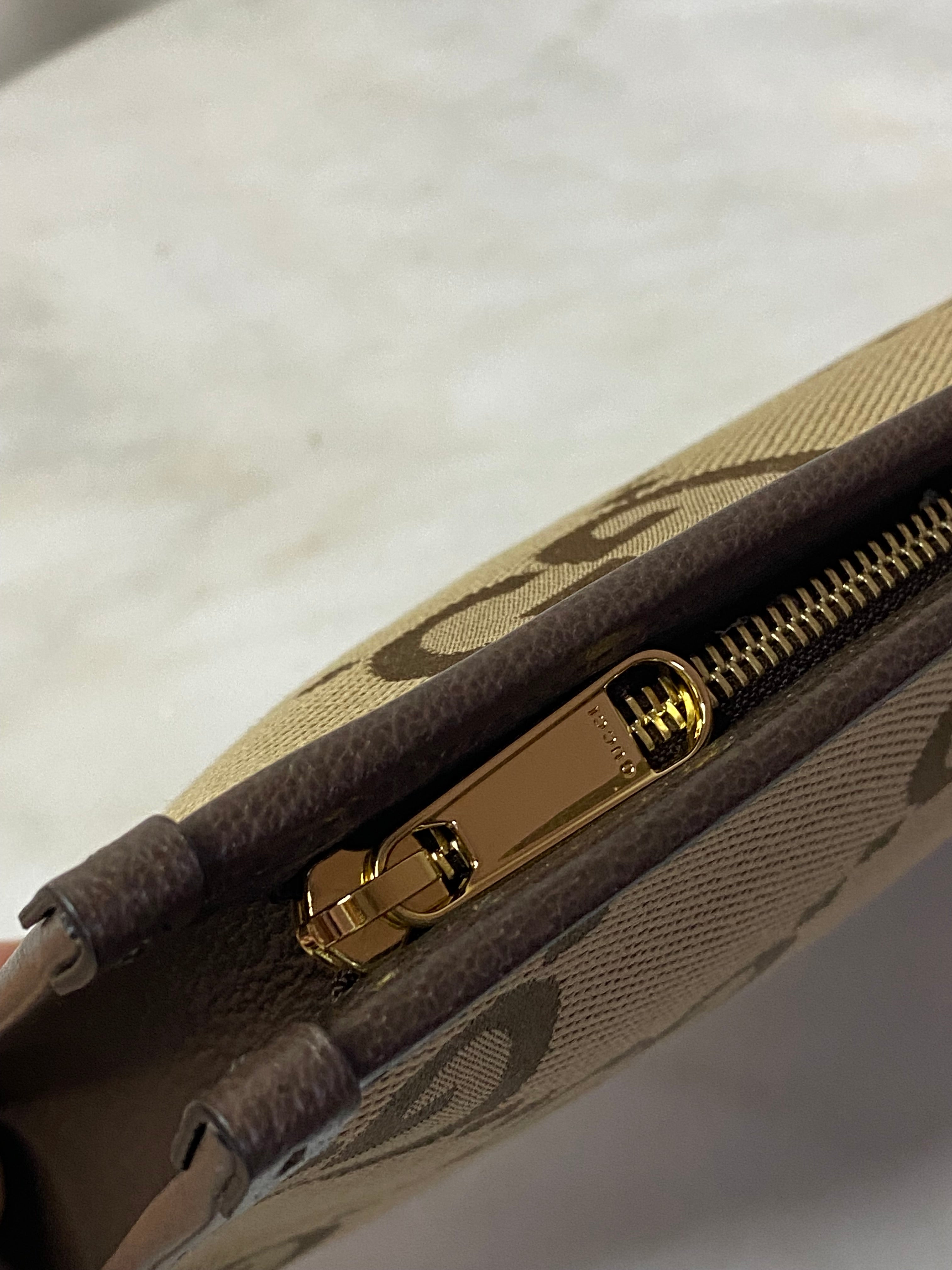 Gucci Brown GG Clutch-Clutch-Gucci-The Closet Egypt