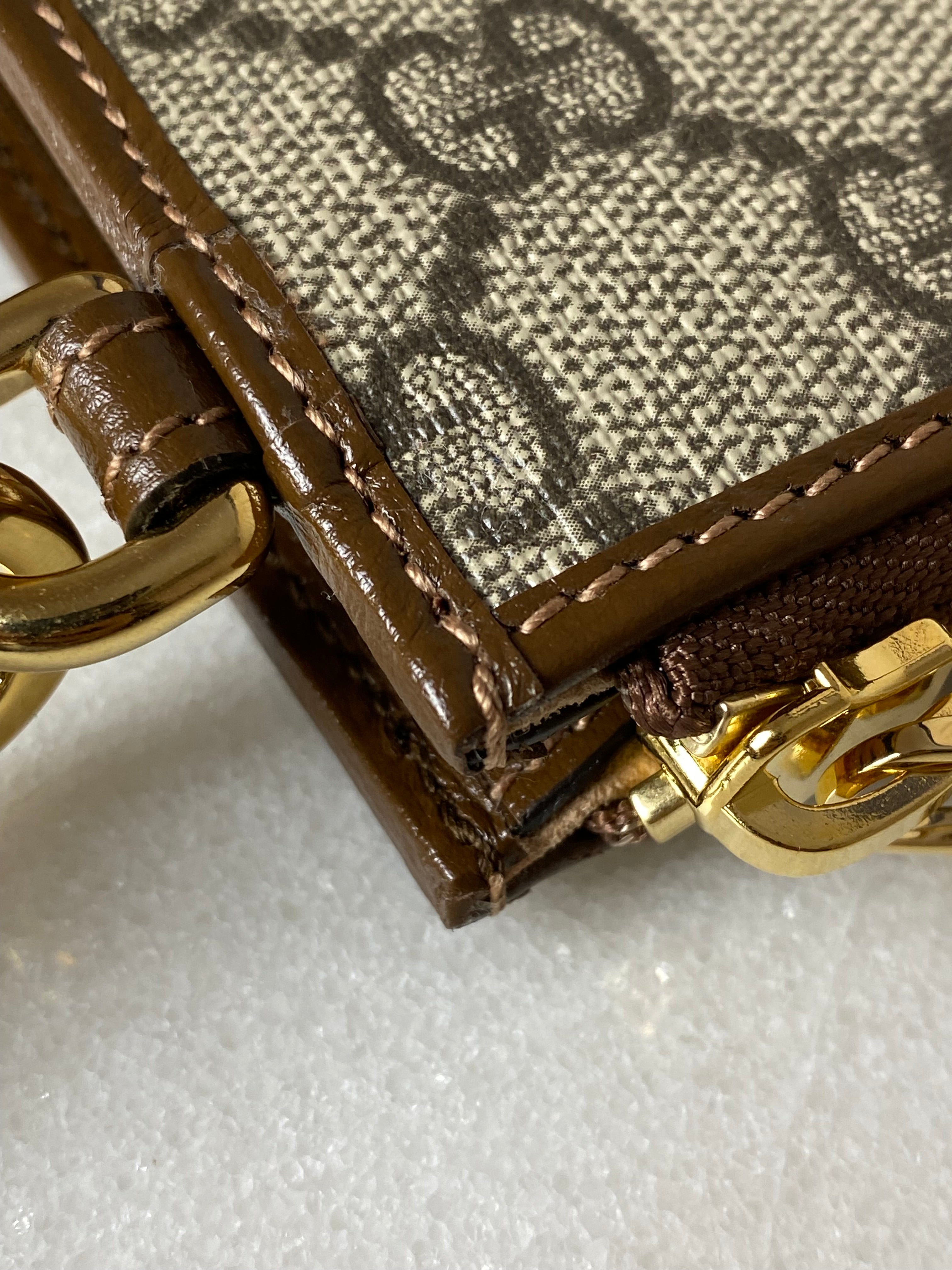 Gucci Brown GG Clutch