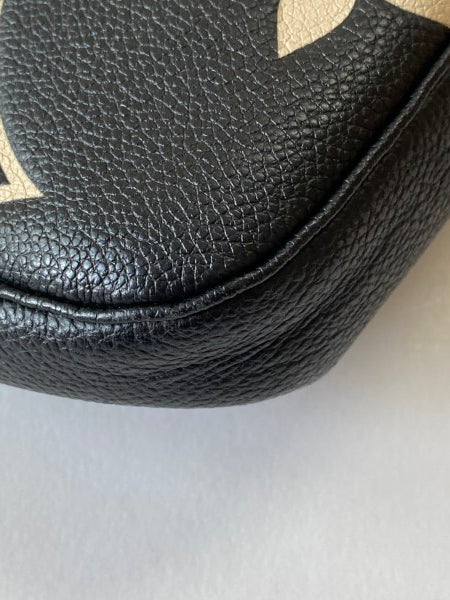 Louis Vuitton Bicolor Empreinte Monogram Giant Multi Pochette-Pochette-Louis Vuitton-The Closet Egypt