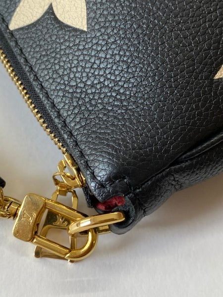 Louis Vuitton Bicolor Empreinte Monogram Giant Multi Pochette-Pochette-Louis Vuitton-The Closet Egypt