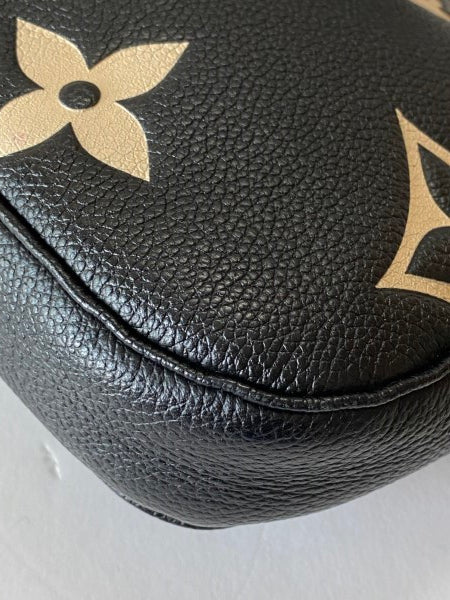 Louis Vuitton Bicolor Empreinte Monogram Giant Multi Pochette-Pochette-Louis Vuitton-The Closet Egypt