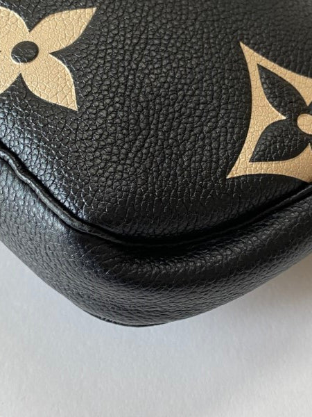 Louis Vuitton Bicolor Empreinte Monogram Giant Multi Pochette-Pochette-Louis Vuitton-The Closet Egypt