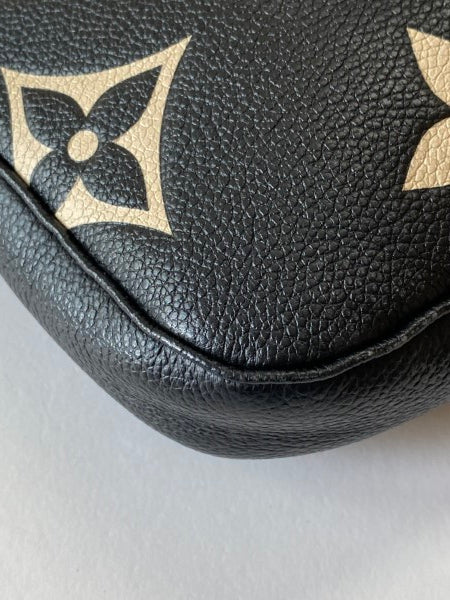 Louis Vuitton Bicolor Empreinte Monogram Giant Multi Pochette-Pochette-Louis Vuitton-The Closet Egypt