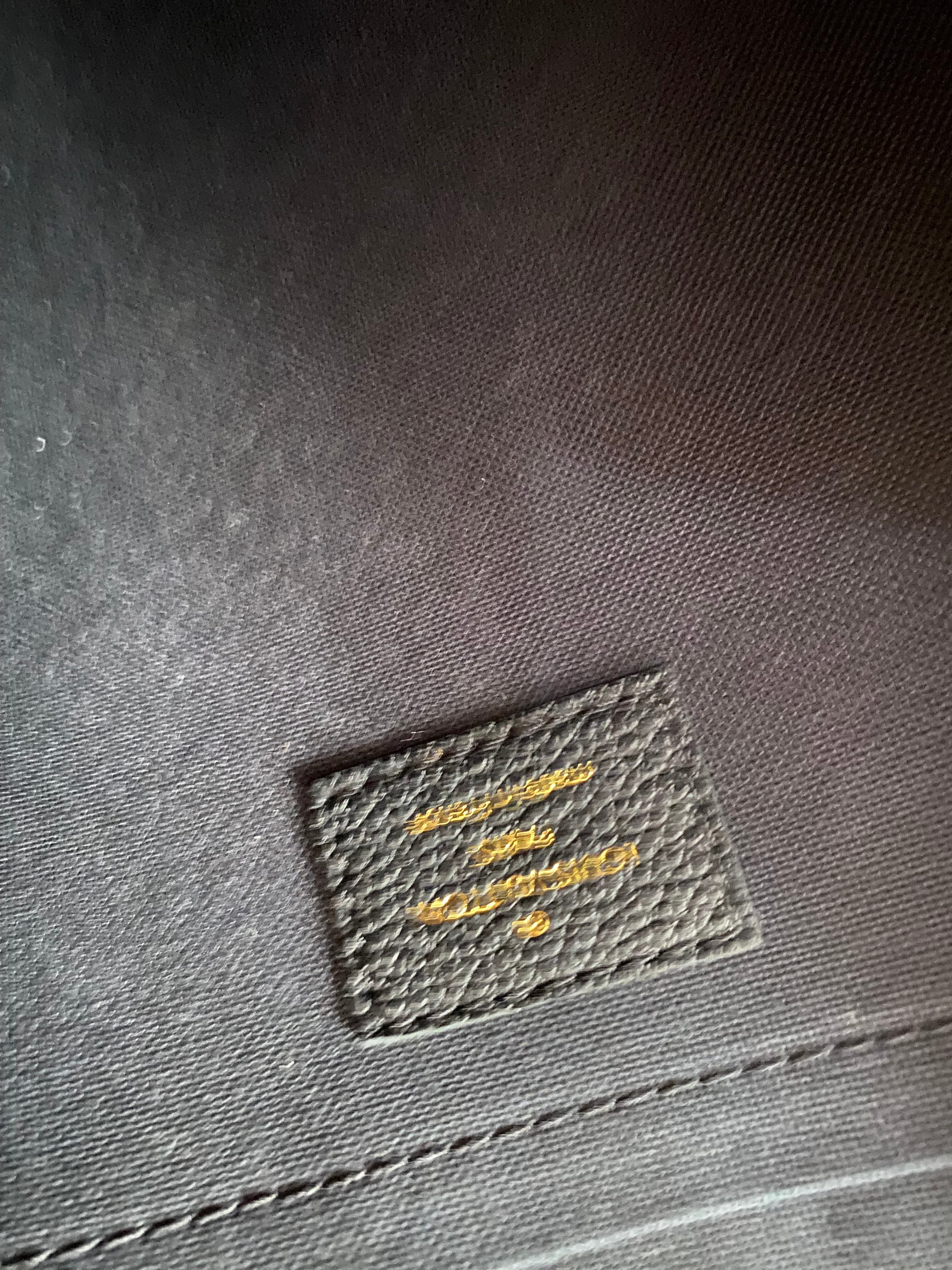 Louis Vuitton Black Monogram Empreinte Daily Pouch-Pouch-Louis Vuitton-The Closet Egypt