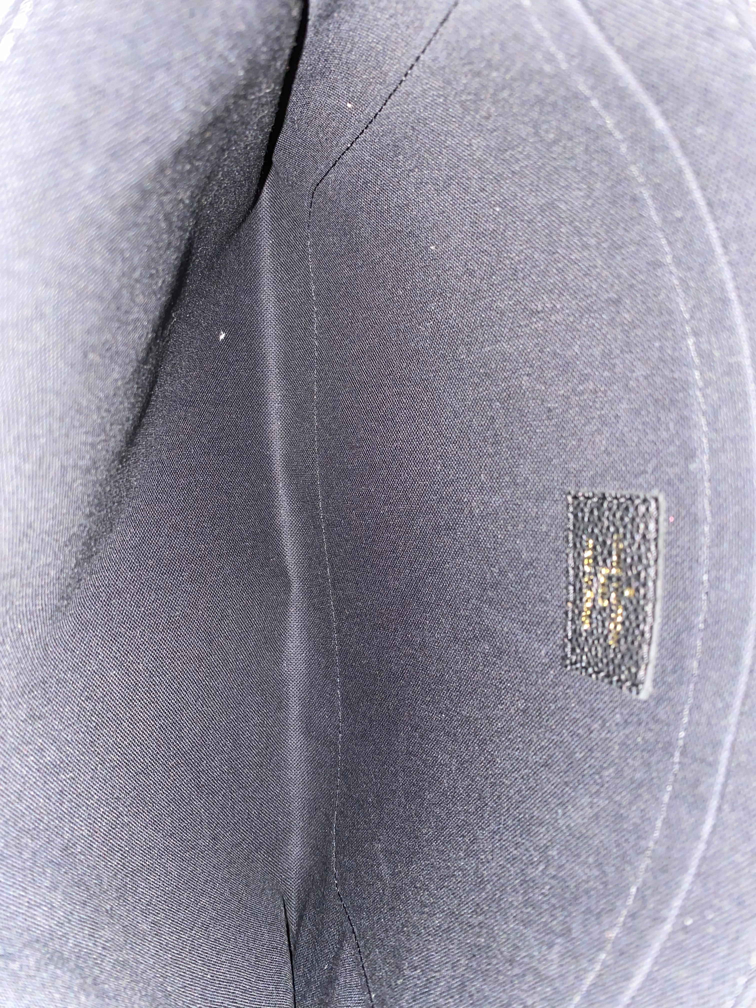 Louis Vuitton Black Monogram Empreinte Daily Pouch-Pouch-Louis Vuitton-The Closet Egypt