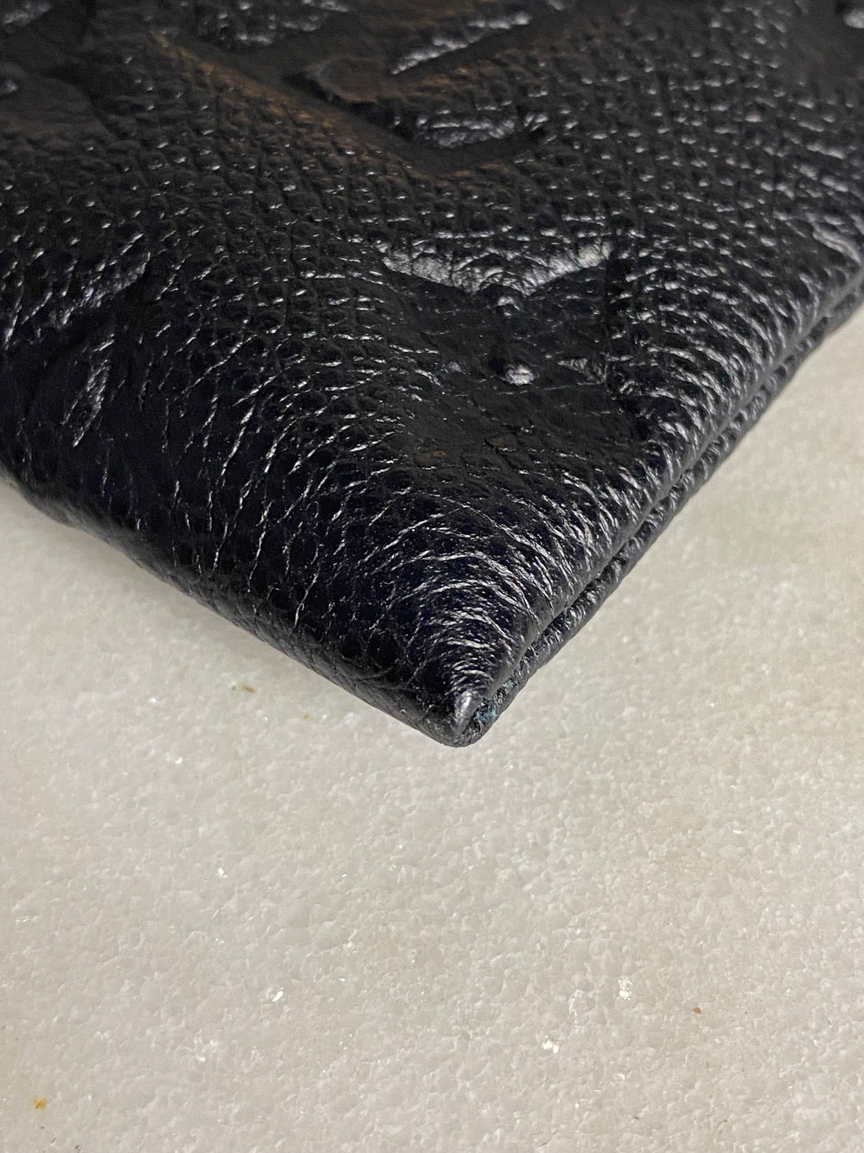 Louis Vuitton Black Monogram Empreinte Daily Pouch-Pouch-Louis Vuitton-The Closet Egypt