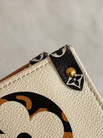 Louis Vuitton Ivory Monogram Jungle Onthego Bag-handbag-Louis Vuitton-The Closet Egypt