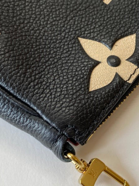 Louis Vuitton Bicolor Empreinte Monogram Giant Multi Pochette-Pochette-Louis Vuitton-The Closet Egypt