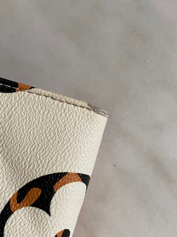 Louis Vuitton Ivory Monogram Jungle Onthego Bag-handbag-Louis Vuitton-The Closet Egypt