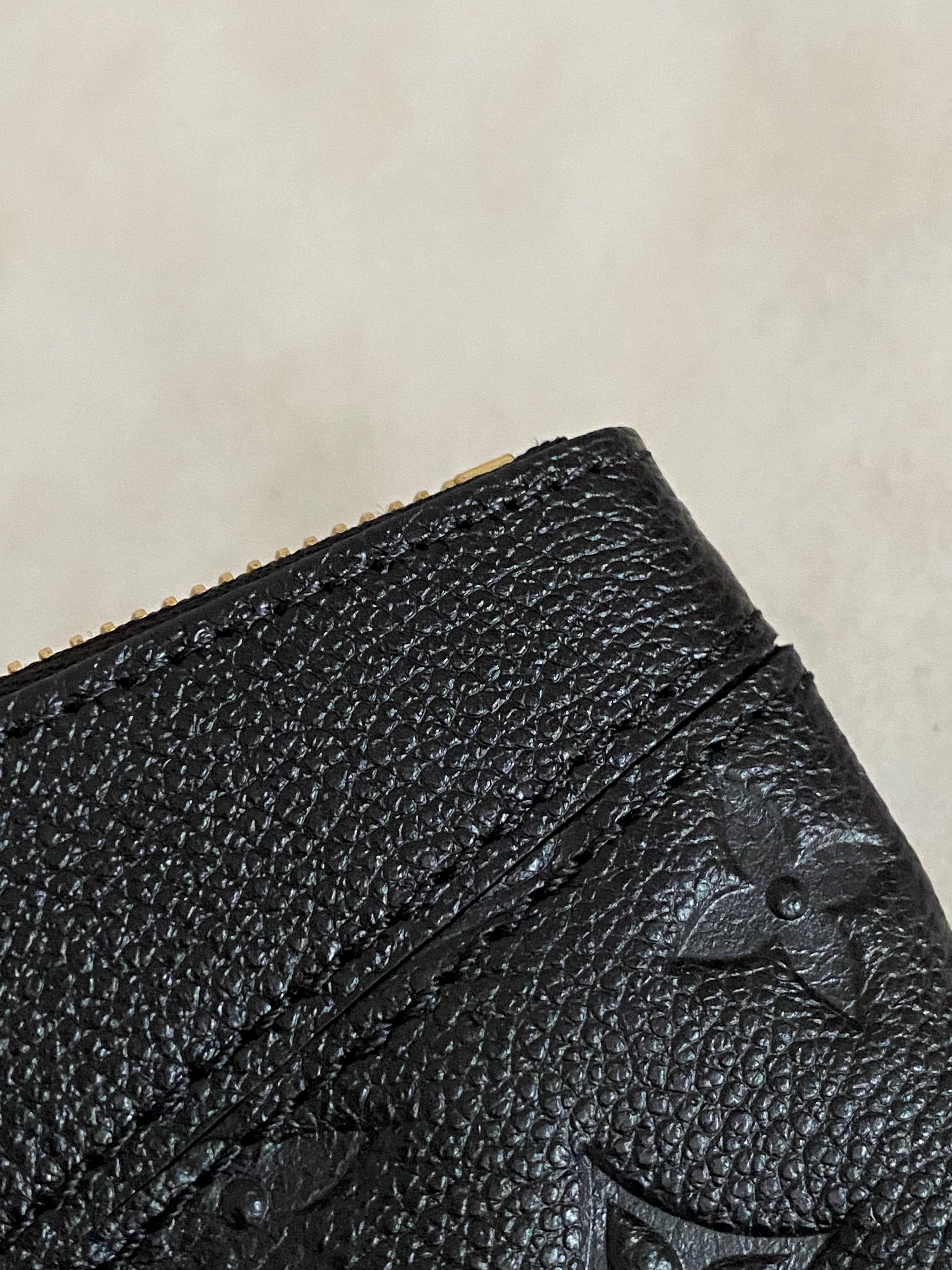 Louis Vuitton Black Monogram Empreinte Daily Pouch-Pouch-Louis Vuitton-The Closet Egypt