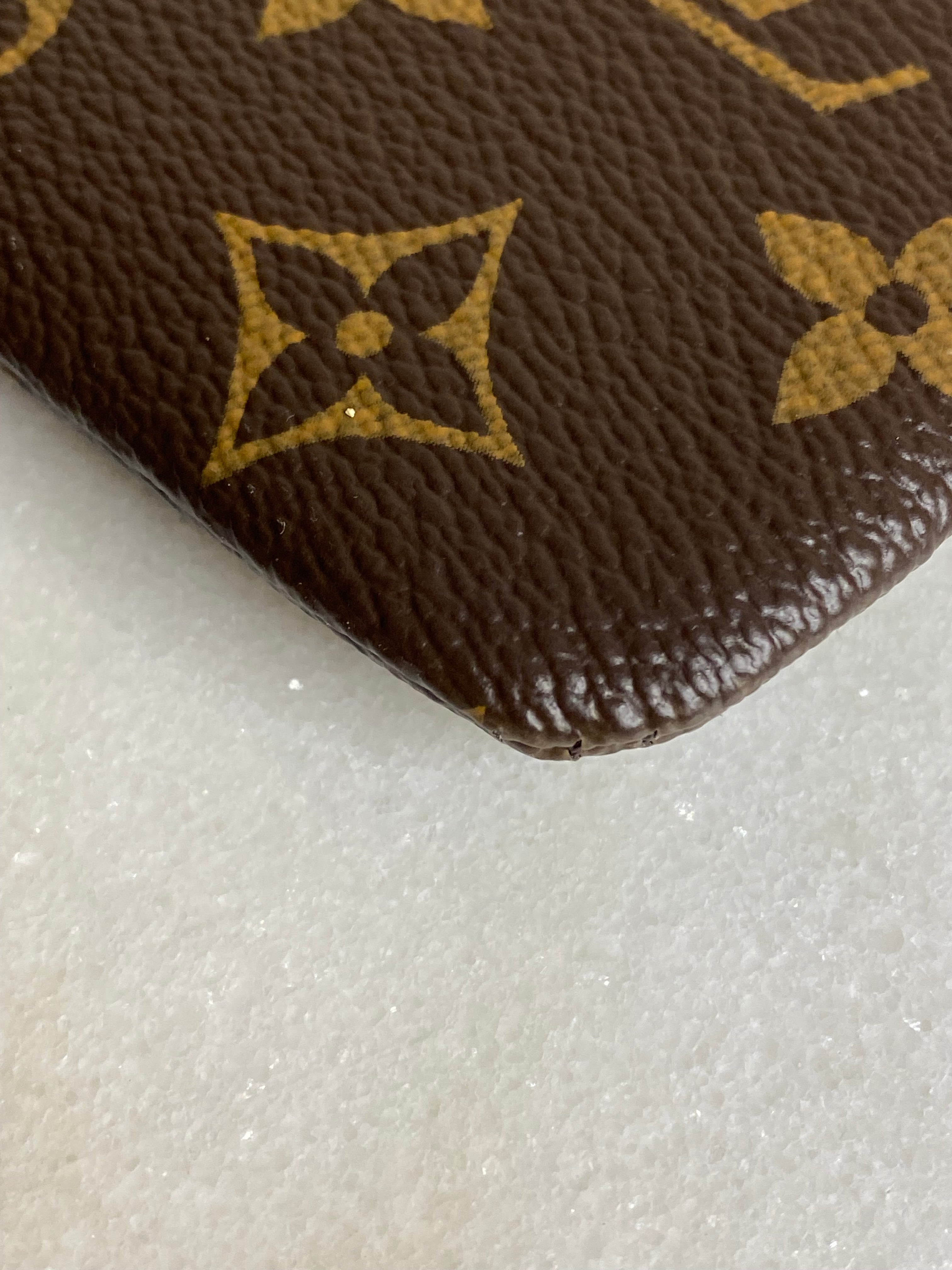 Louis Vuitton Monogram Black Daily Pouch-Pouch-Louis Vuitton-The Closet Egypt