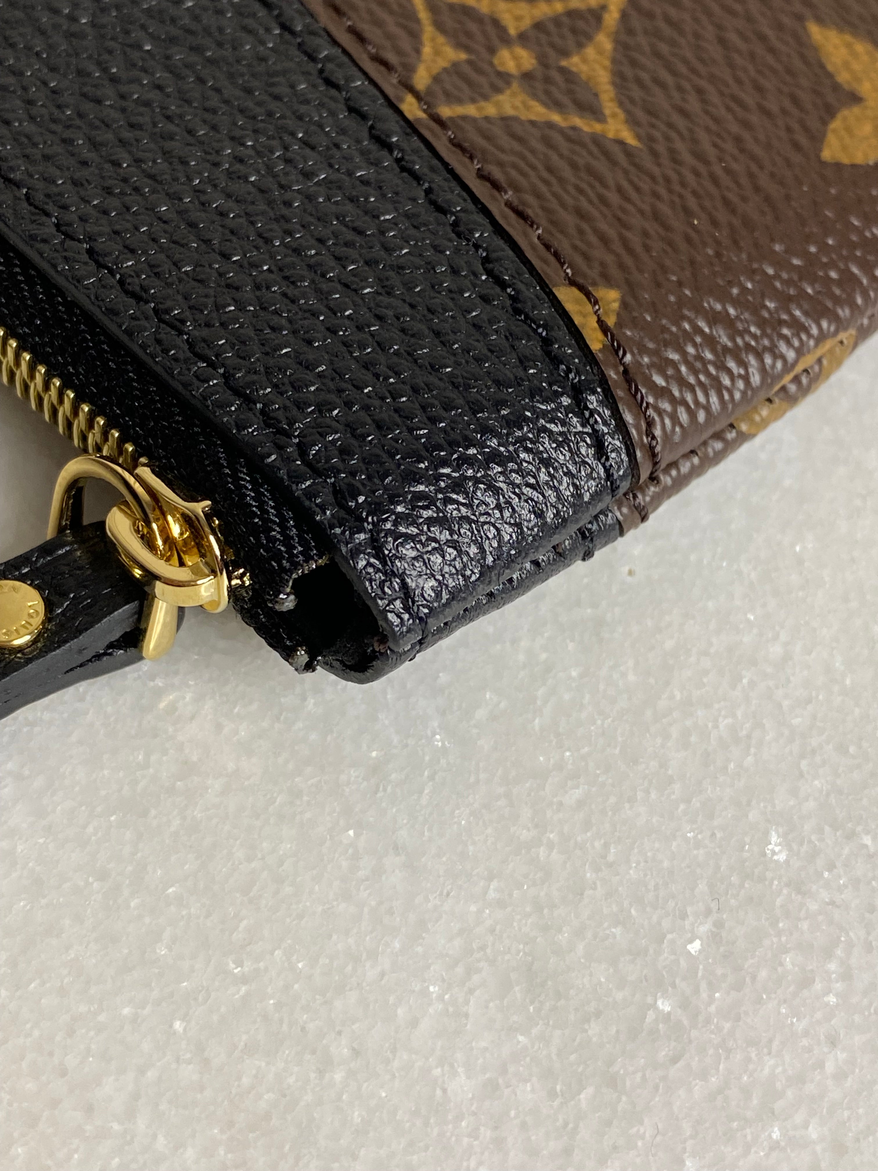 Louis Vuitton Monogram Black Daily Pouch-Pouch-Louis Vuitton-The Closet Egypt