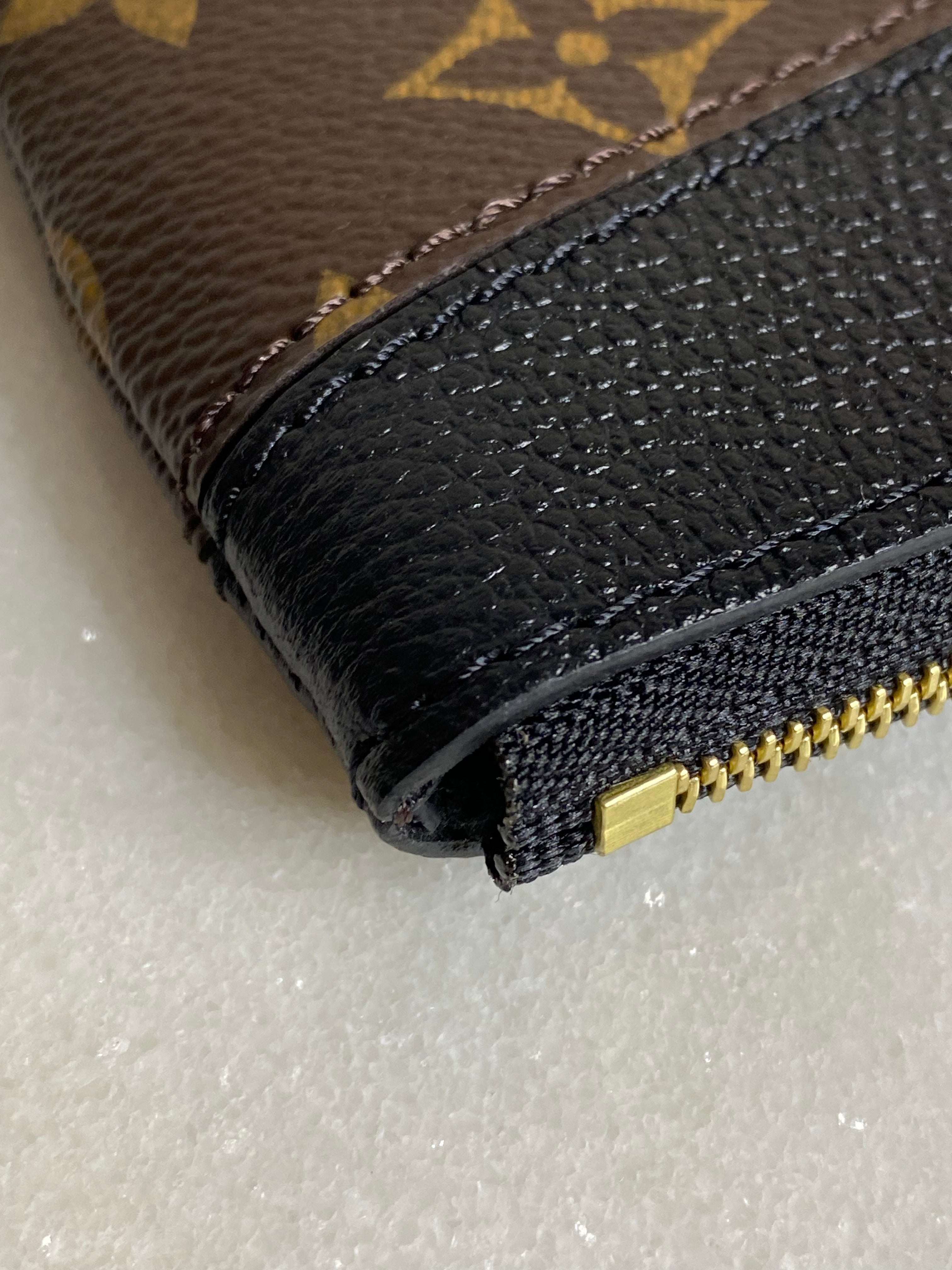 Louis Vuitton Monogram Black Daily Pouch-Pouch-Louis Vuitton-The Closet Egypt