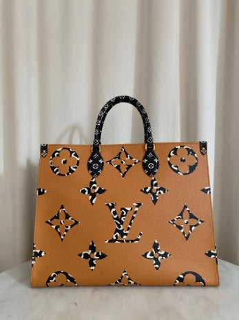 Louis Vuitton Ivory Monogram Jungle Onthego Bag-handbag-Louis Vuitton-The Closet Egypt