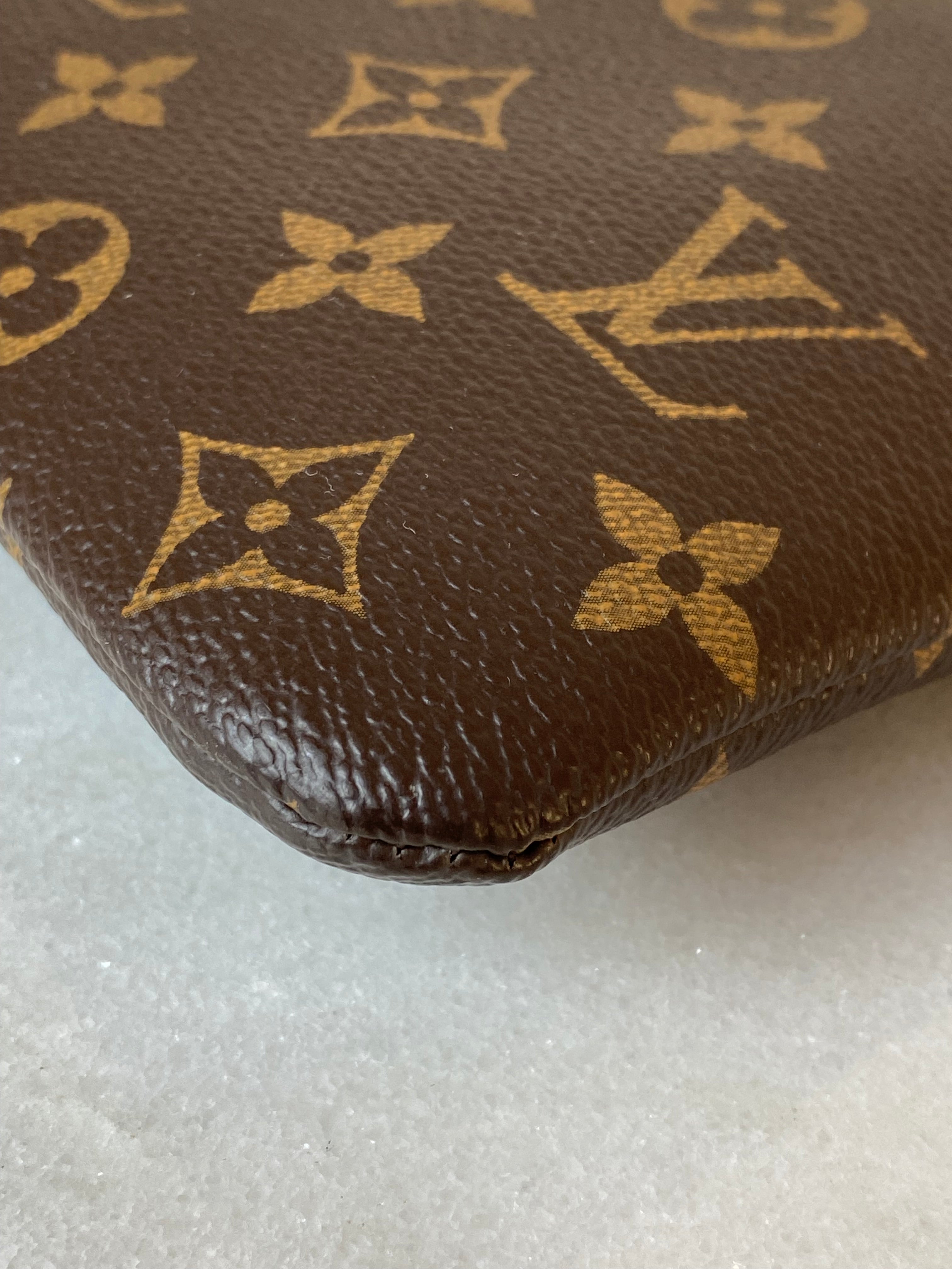 Louis Vuitton Monogram Black Daily Pouch-Pouch-Louis Vuitton-The Closet Egypt