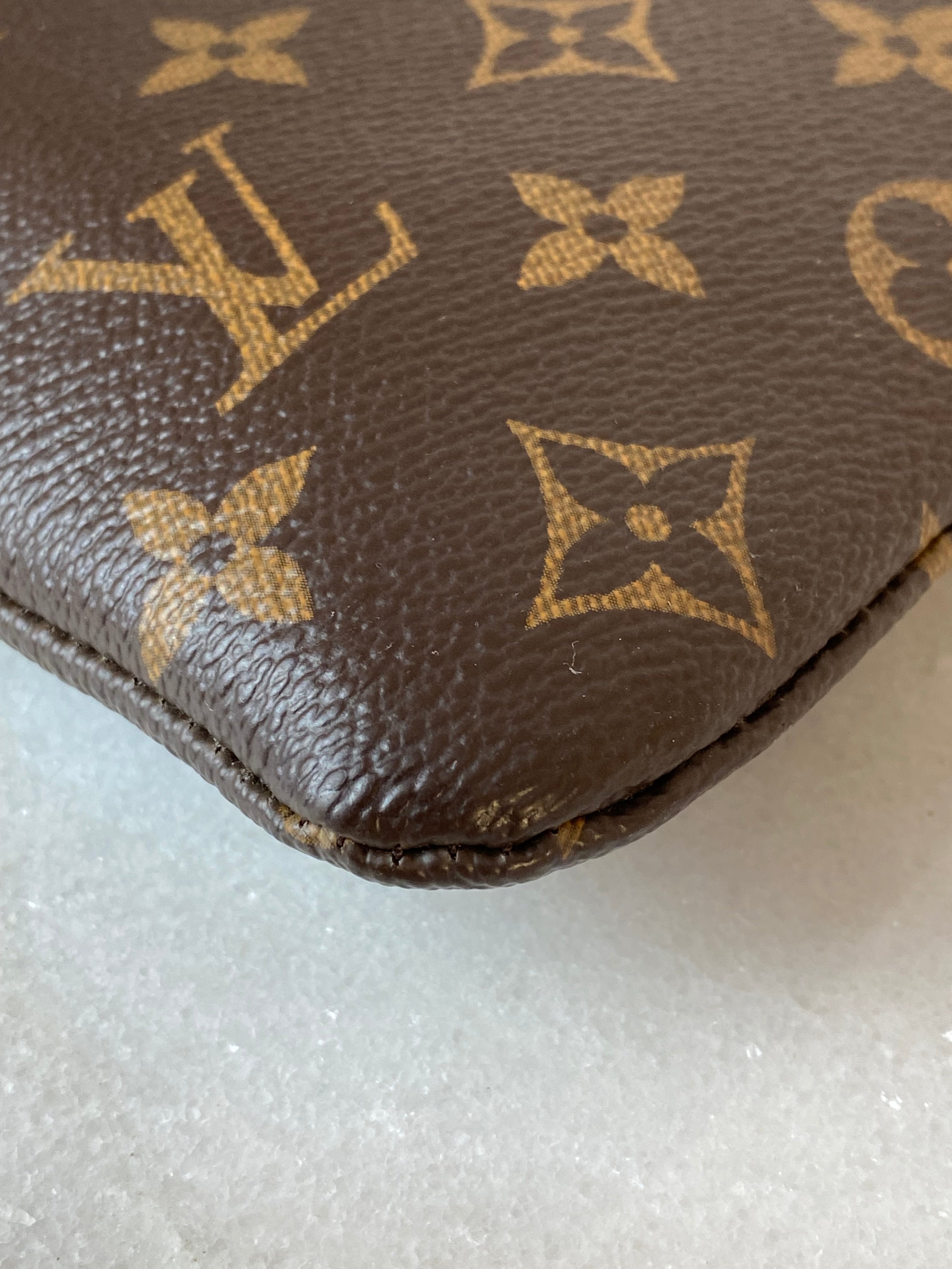 Louis Vuitton Monogram Black Daily Pouch-Pouch-Louis Vuitton-The Closet Egypt