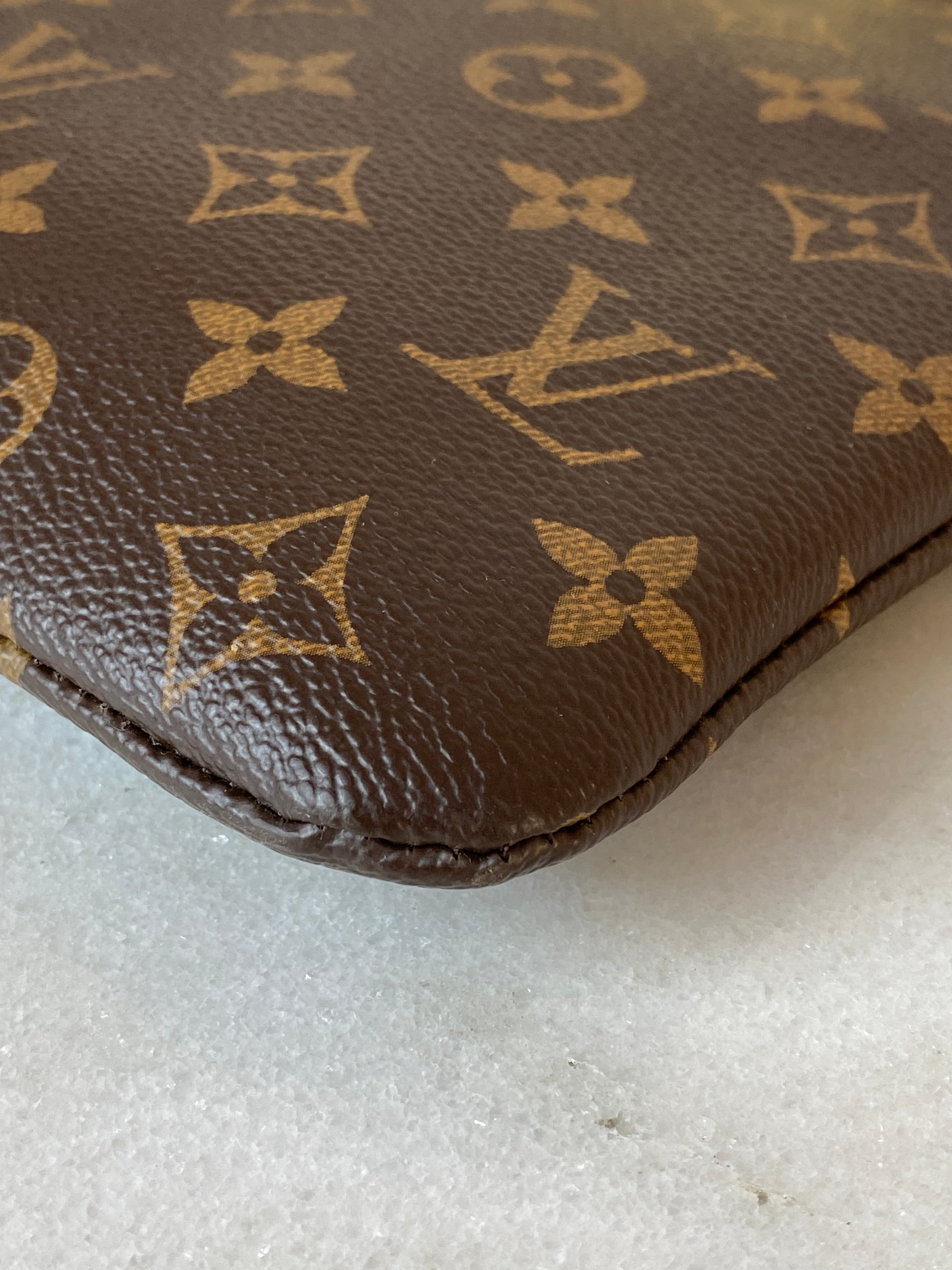 Louis Vuitton Monogram Black Daily Pouch-Pouch-Louis Vuitton-The Closet Egypt