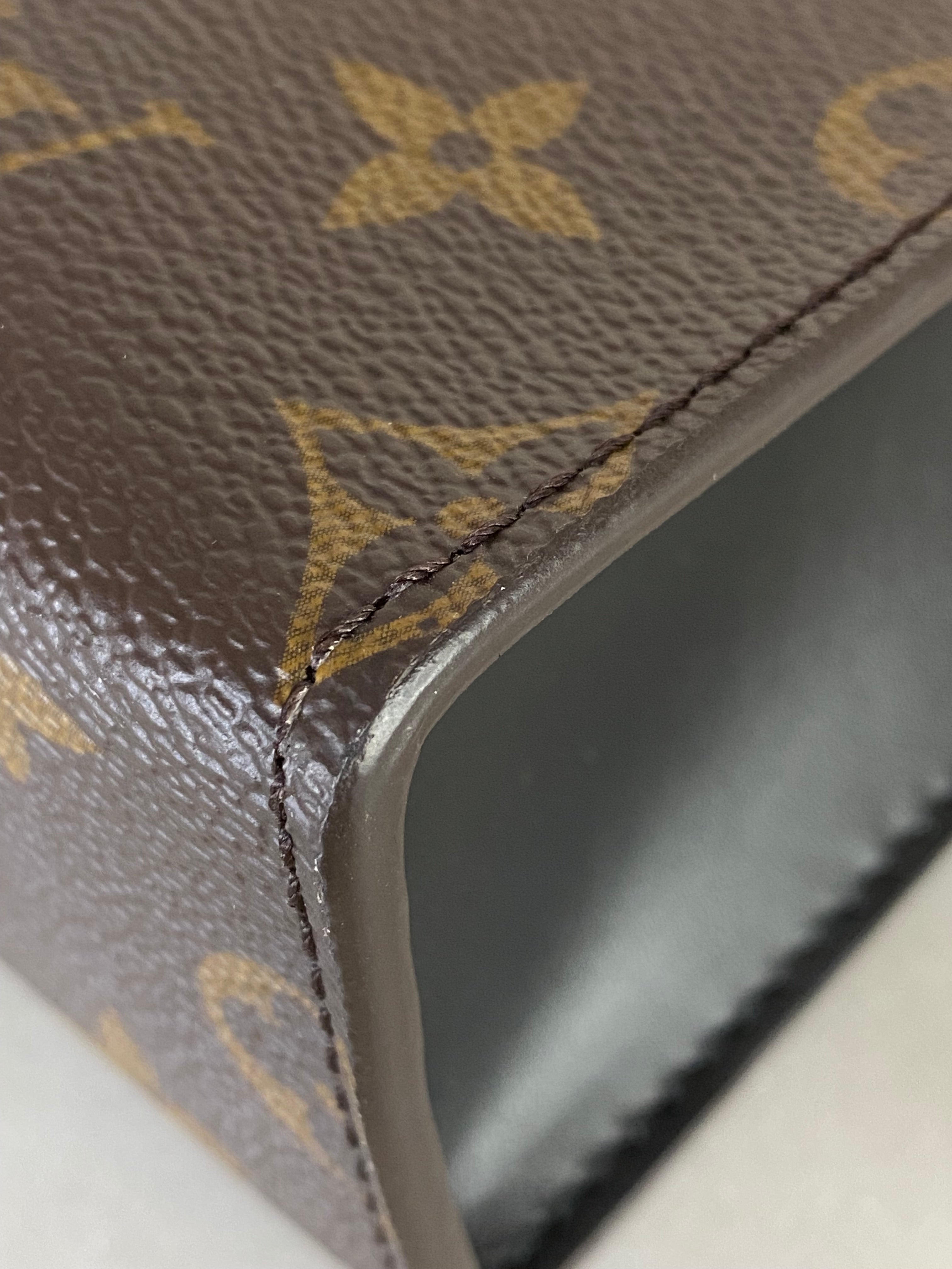 Louis Vuitton Monogram Zip Clutch-Clutch-Louis Vuitton-The Closet Egypt